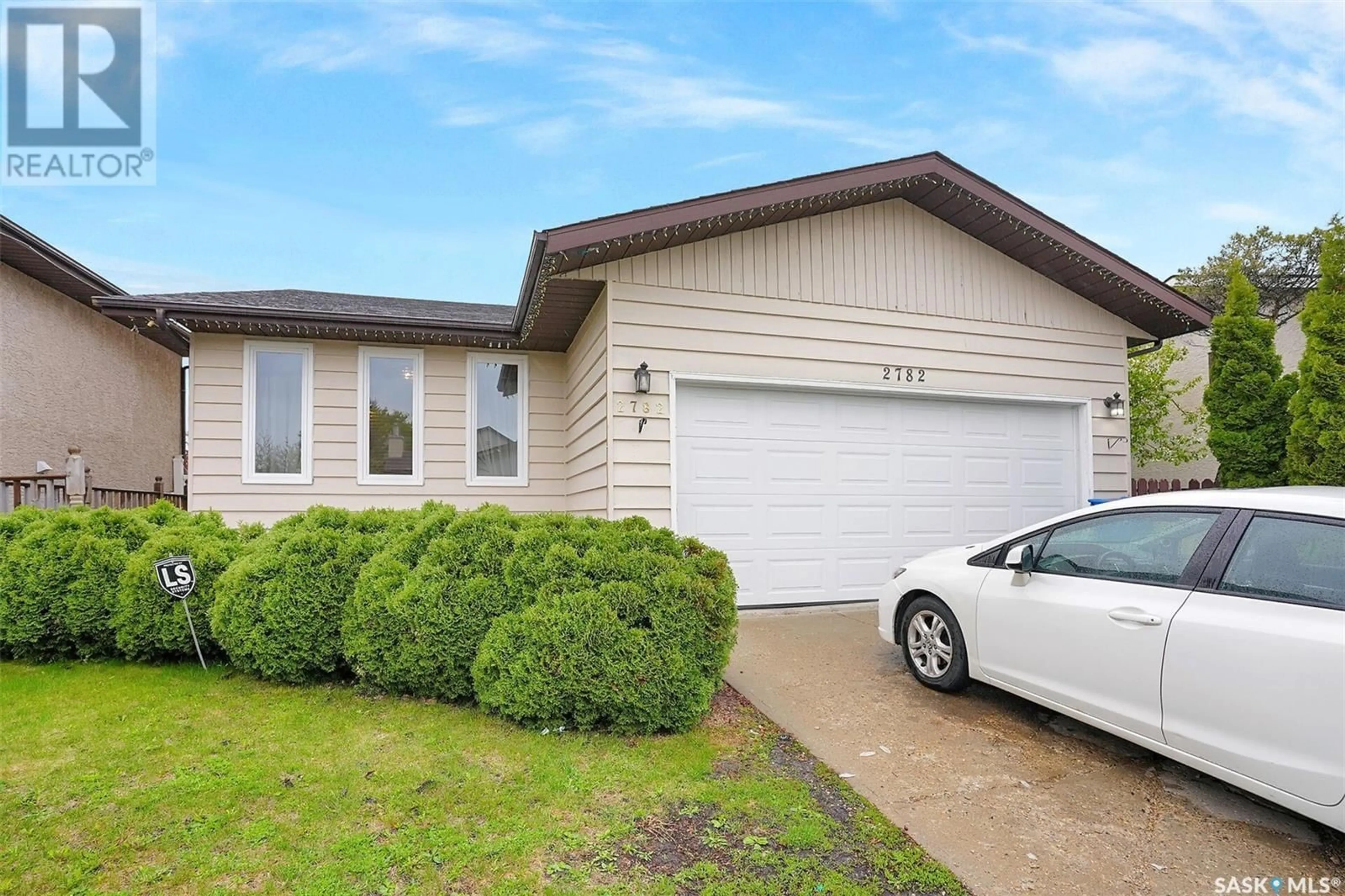 Home with vinyl exterior material, street for 2782 SCHWEITZER DRIVE, Regina Saskatchewan S4V1C5
