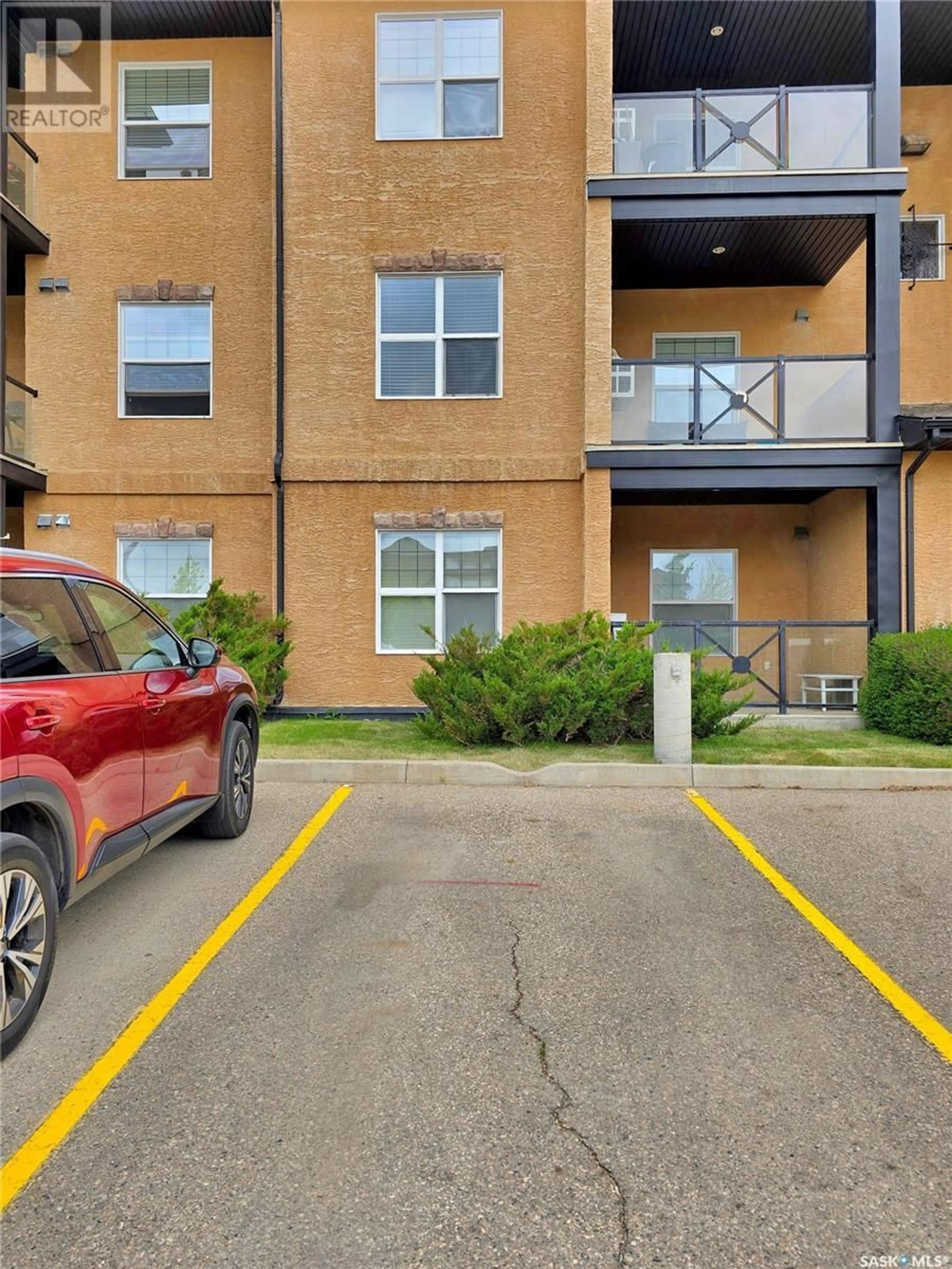 A pic from outside/outdoor area/front of a property/back of a property/a pic from drone, street for 326 - 311 HEROLD ROAD, Saskatoon Saskatchewan S7V0A2