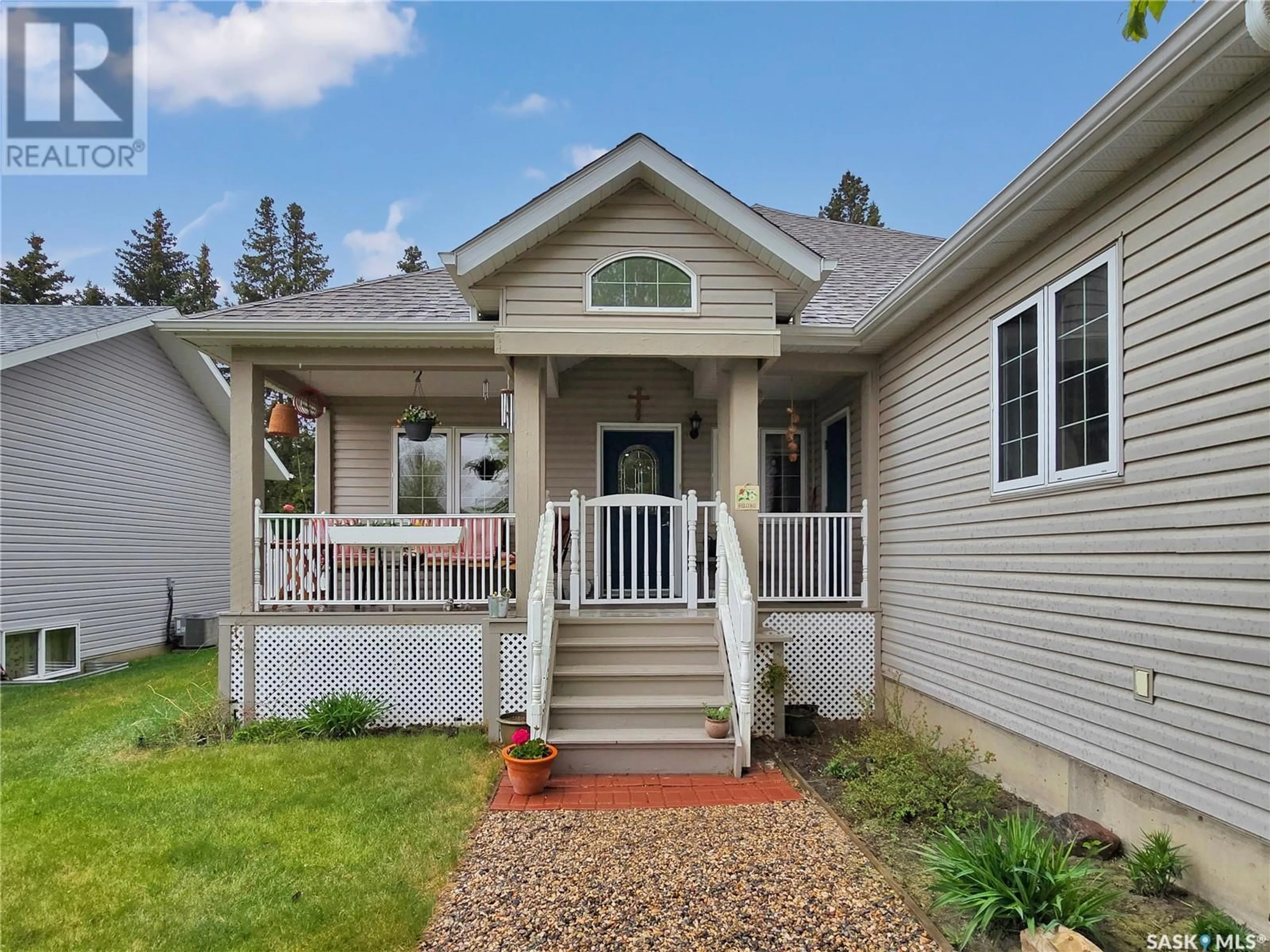 Home with vinyl exterior material, street for 5001 CENTRAL AVENUE, Waldheim Saskatchewan S0K4R0