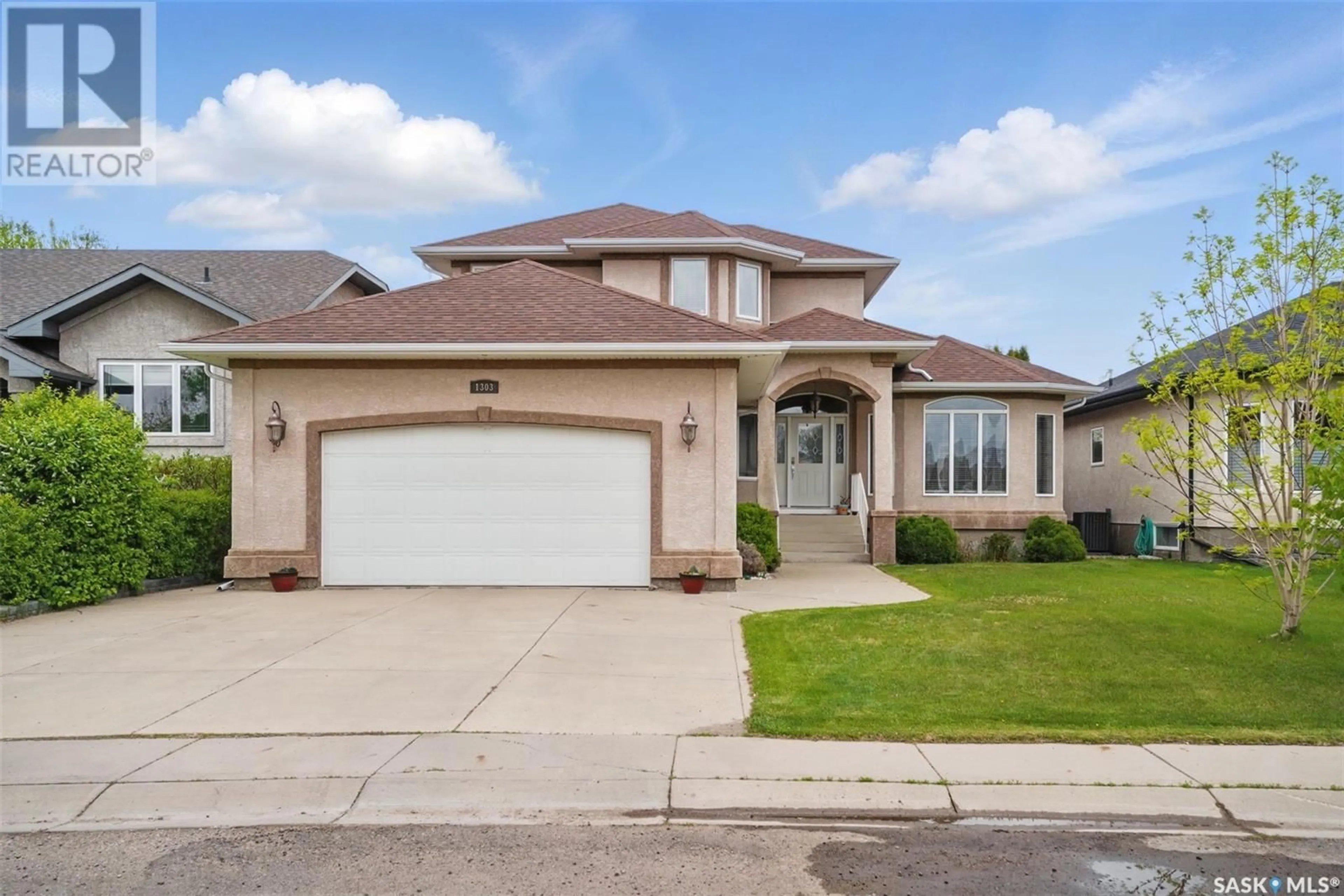 Home with brick exterior material, street for 1303 BEECHMONT CRESCENT, Saskatoon Saskatchewan S7V1E1
