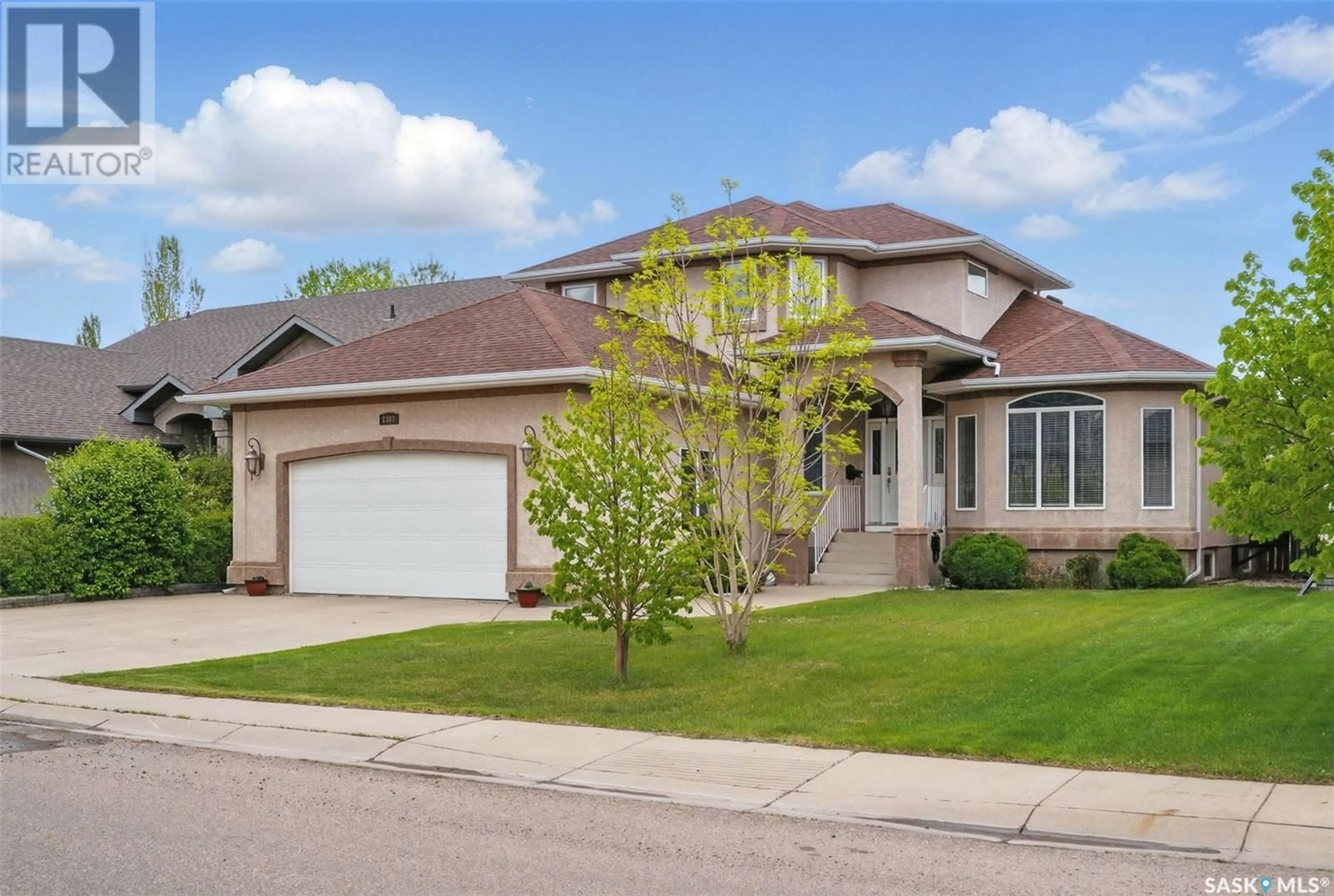 Home with brick exterior material, street for 1303 BEECHMONT CRESCENT, Saskatoon Saskatchewan S7V1E1