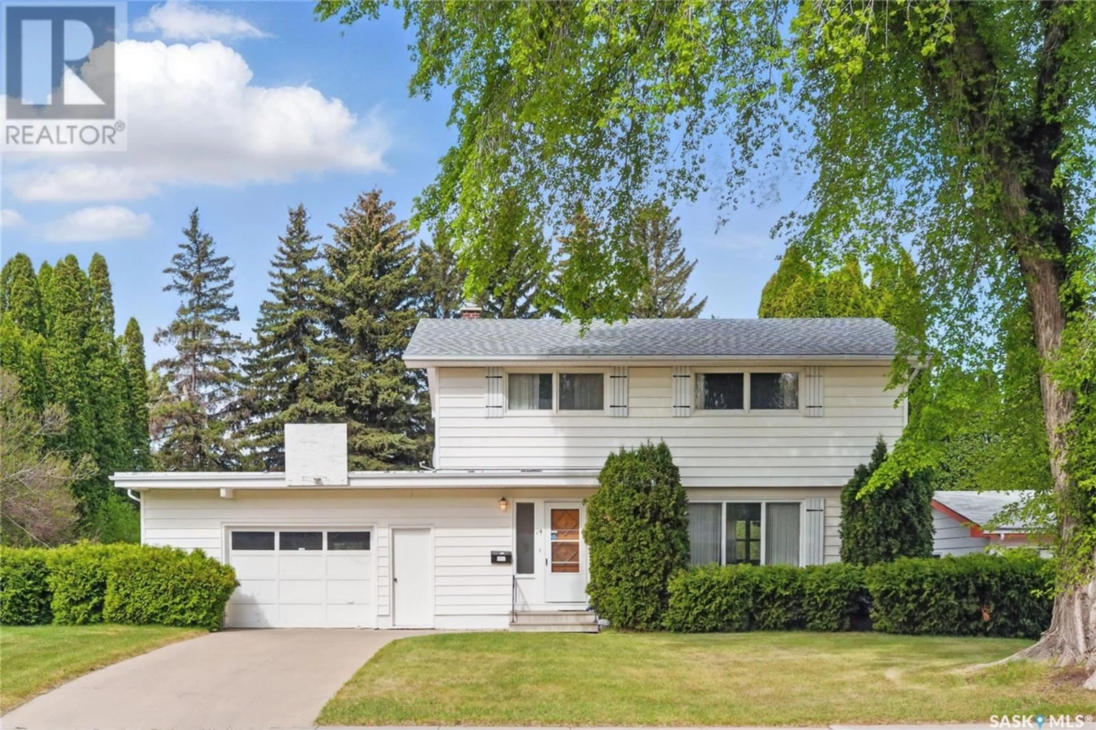 Home with vinyl exterior material, street for 14 PORTEOUS CRESCENT, Saskatoon Saskatchewan S7J2S8