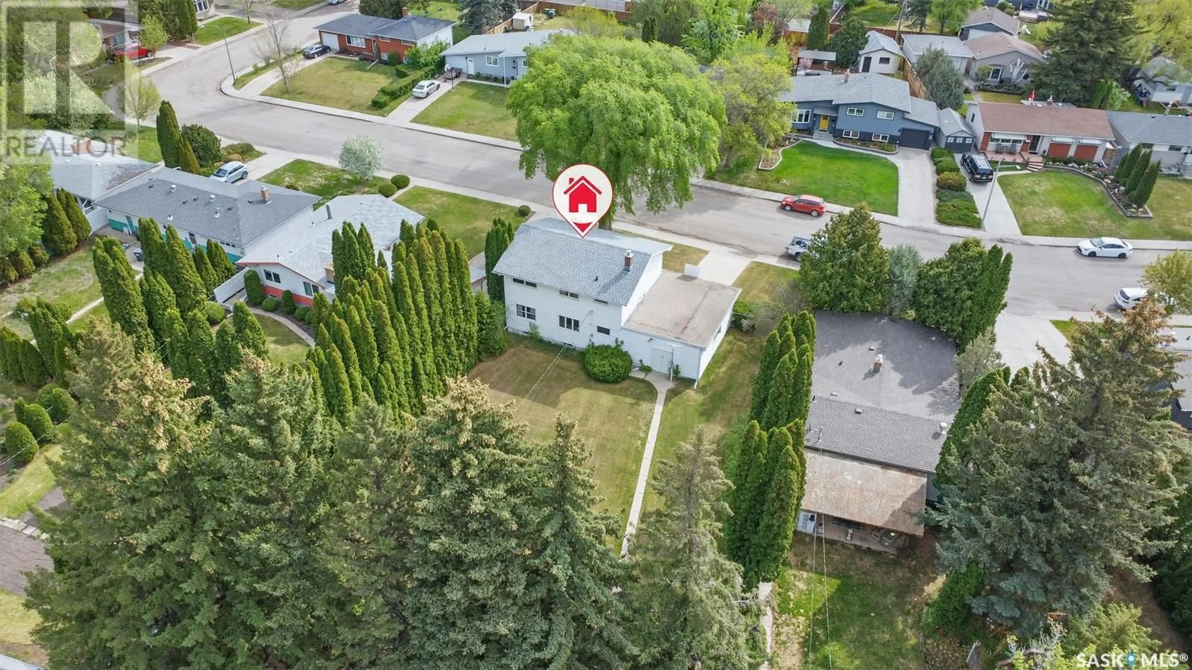 A pic from outside/outdoor area/front of a property/back of a property/a pic from drone, street for 14 PORTEOUS CRESCENT, Saskatoon Saskatchewan S7J2S8