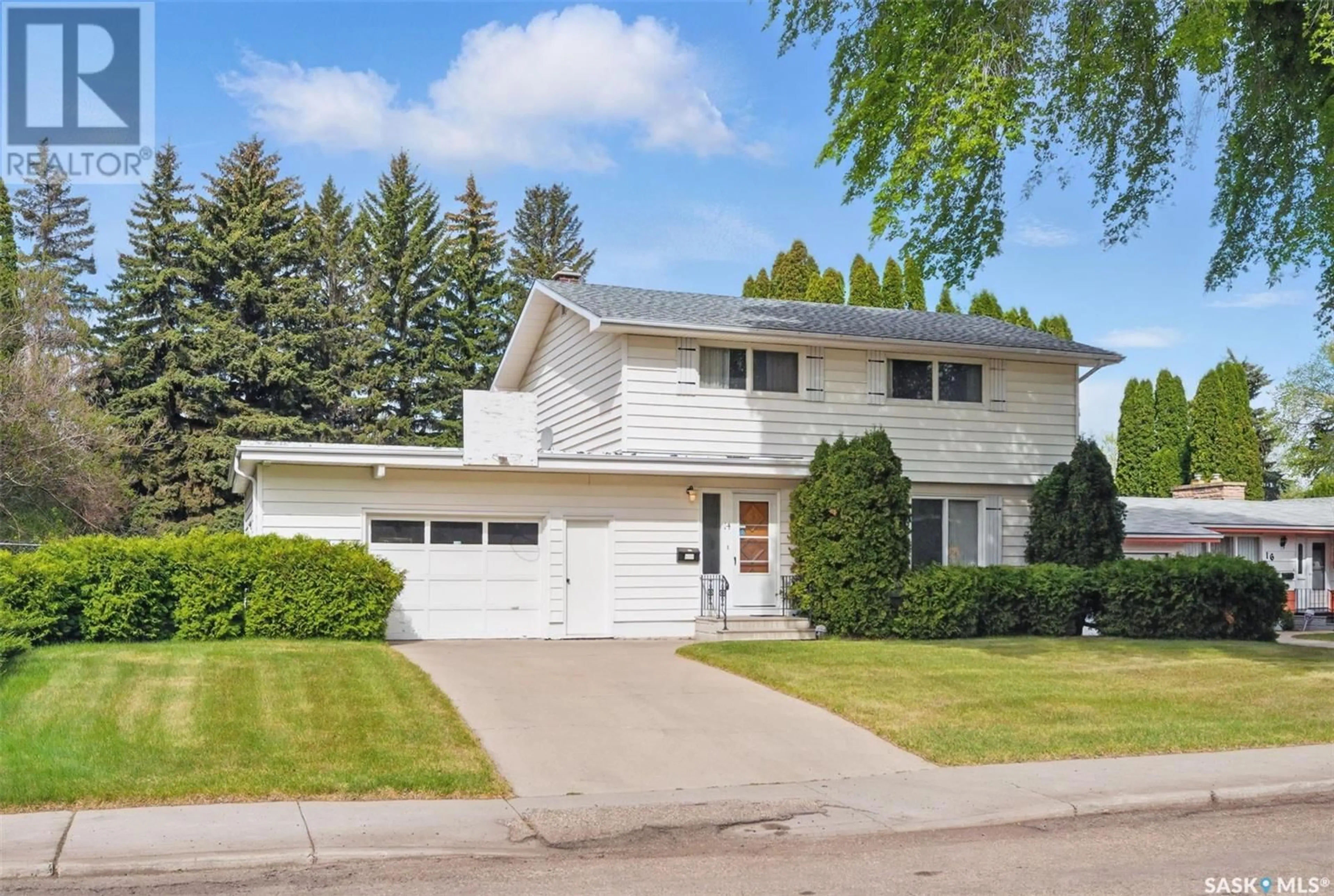 Home with vinyl exterior material, street for 14 PORTEOUS CRESCENT, Saskatoon Saskatchewan S7J2S8