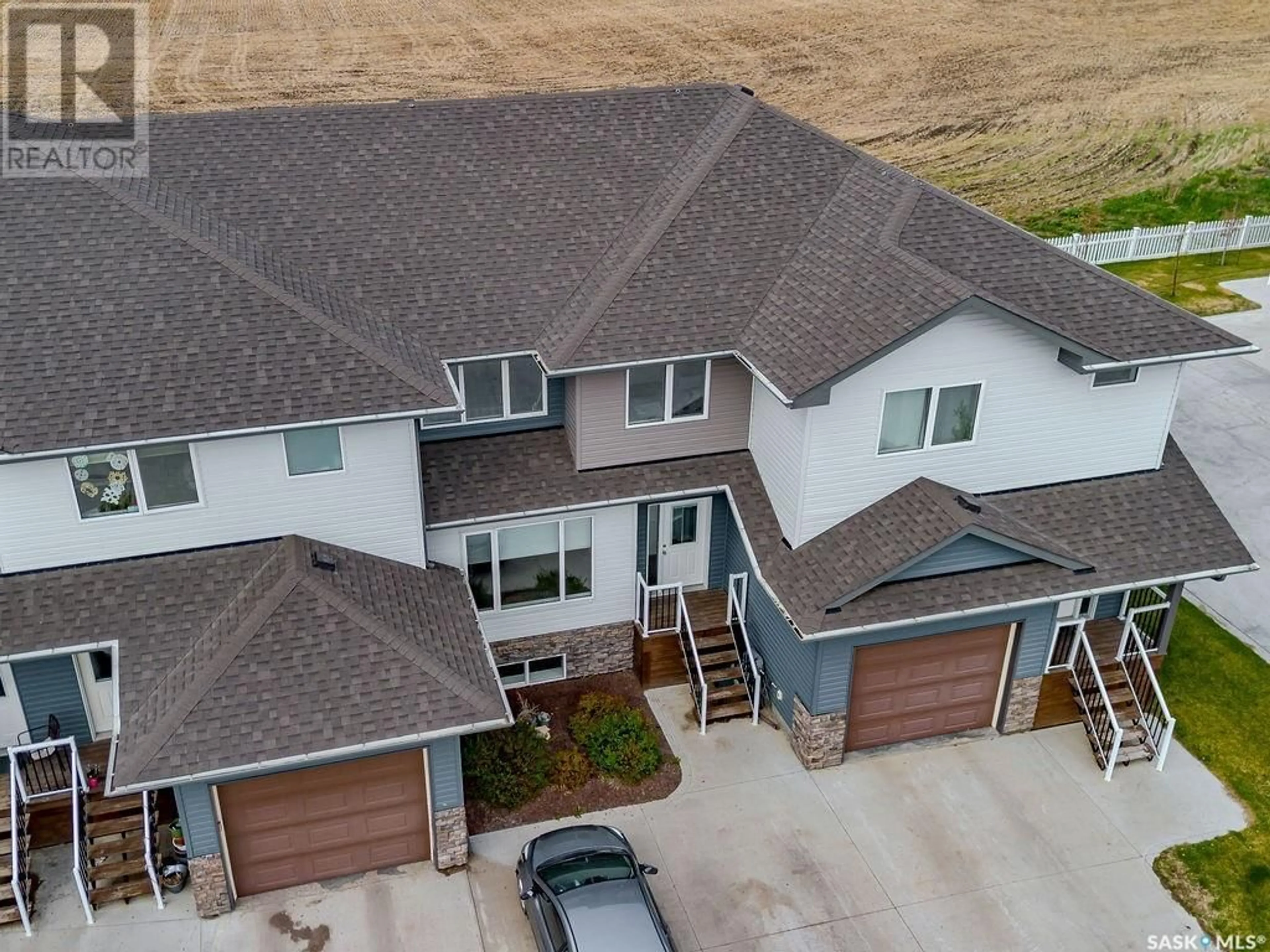 A pic from outside/outdoor area/front of a property/back of a property/a pic from drone, unknown for 301 - 16 CENTENNIAL ROAD, Hague Saskatchewan S0K1X0
