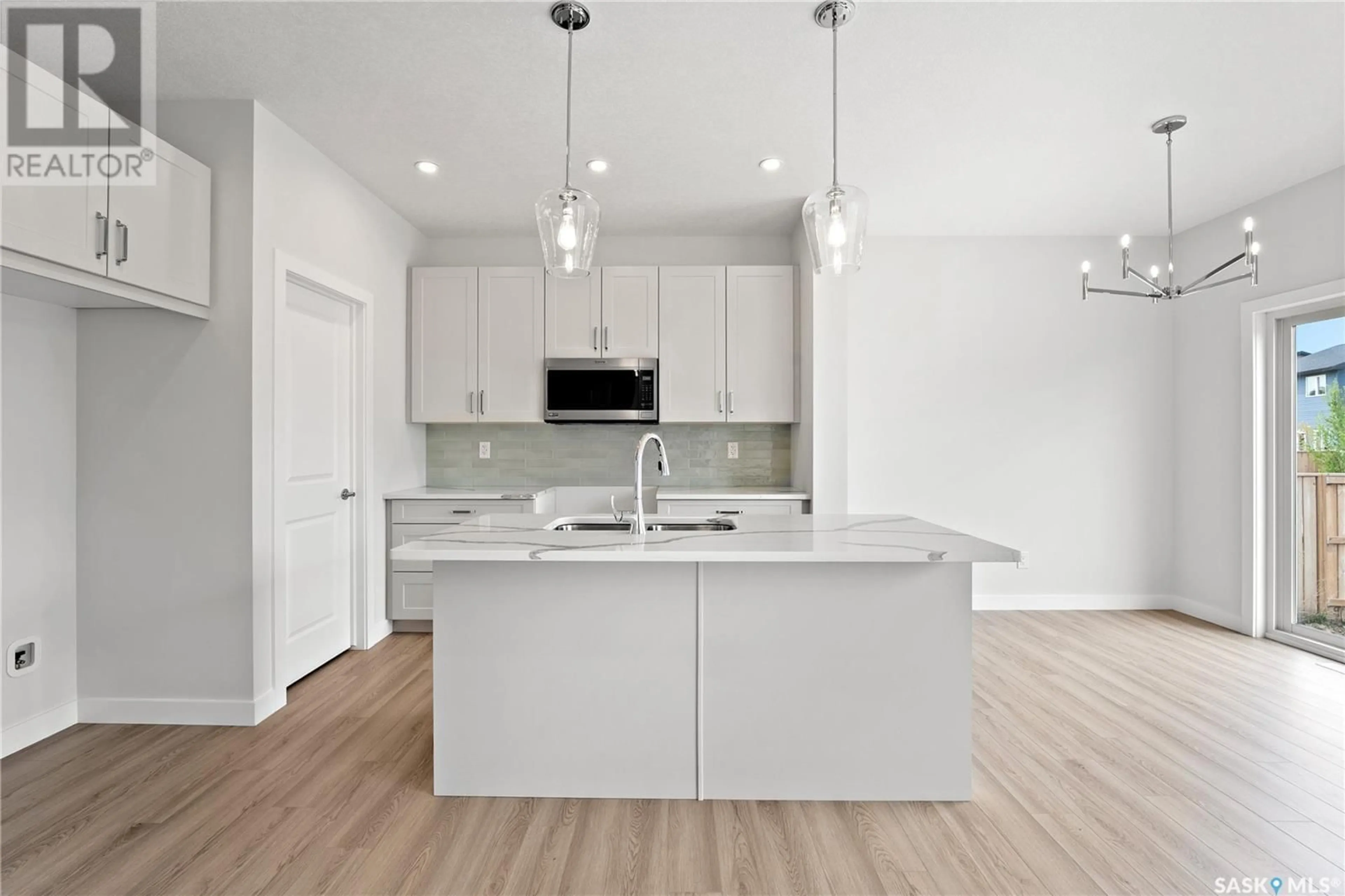 Open concept kitchen, unknown for 1037 3RD STREET, Martensville Saskatchewan S0K2T1
