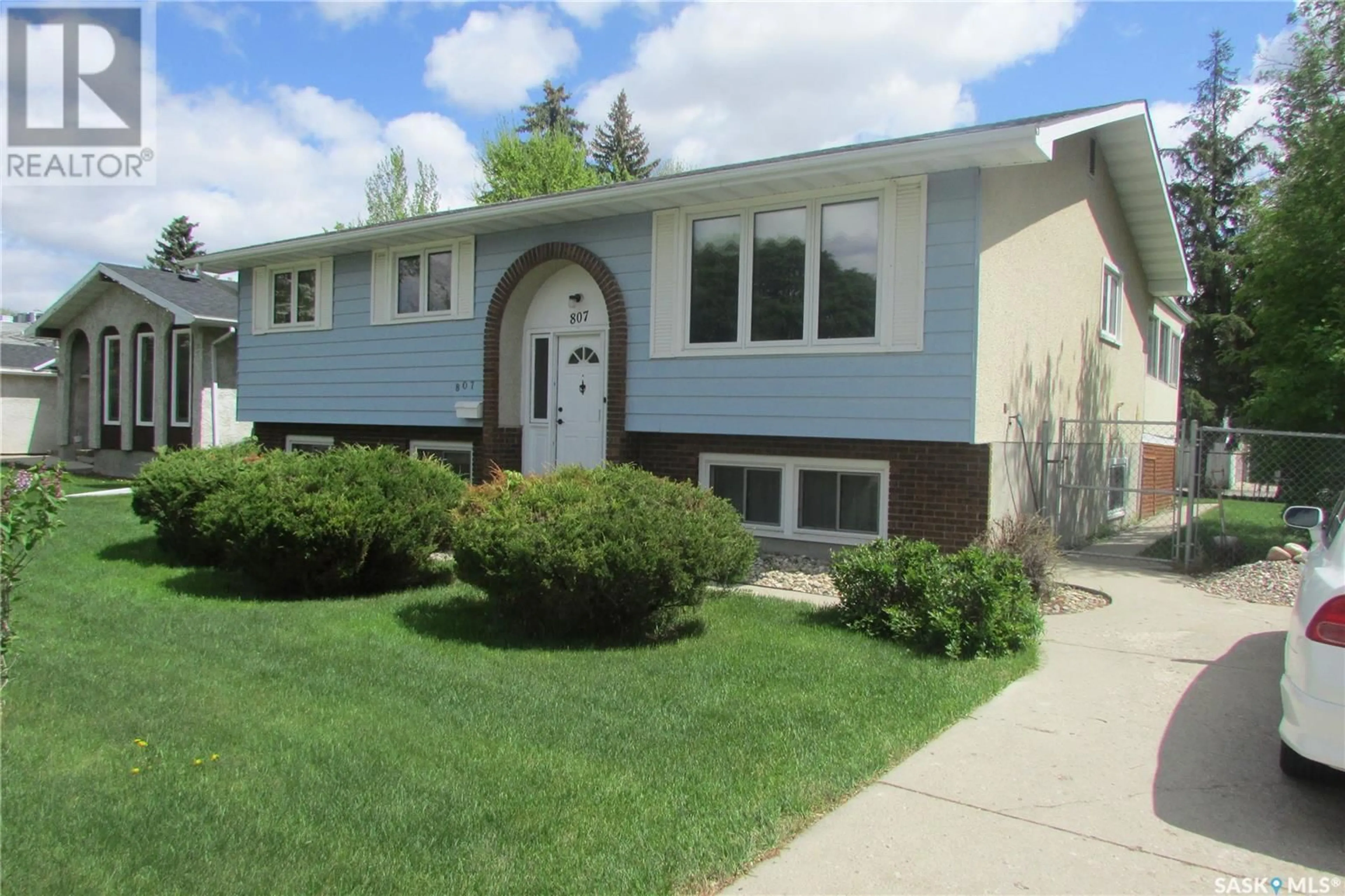 Home with vinyl exterior material, street for 807 MCINTOSH STREET, Regina Saskatchewan S4R6E4