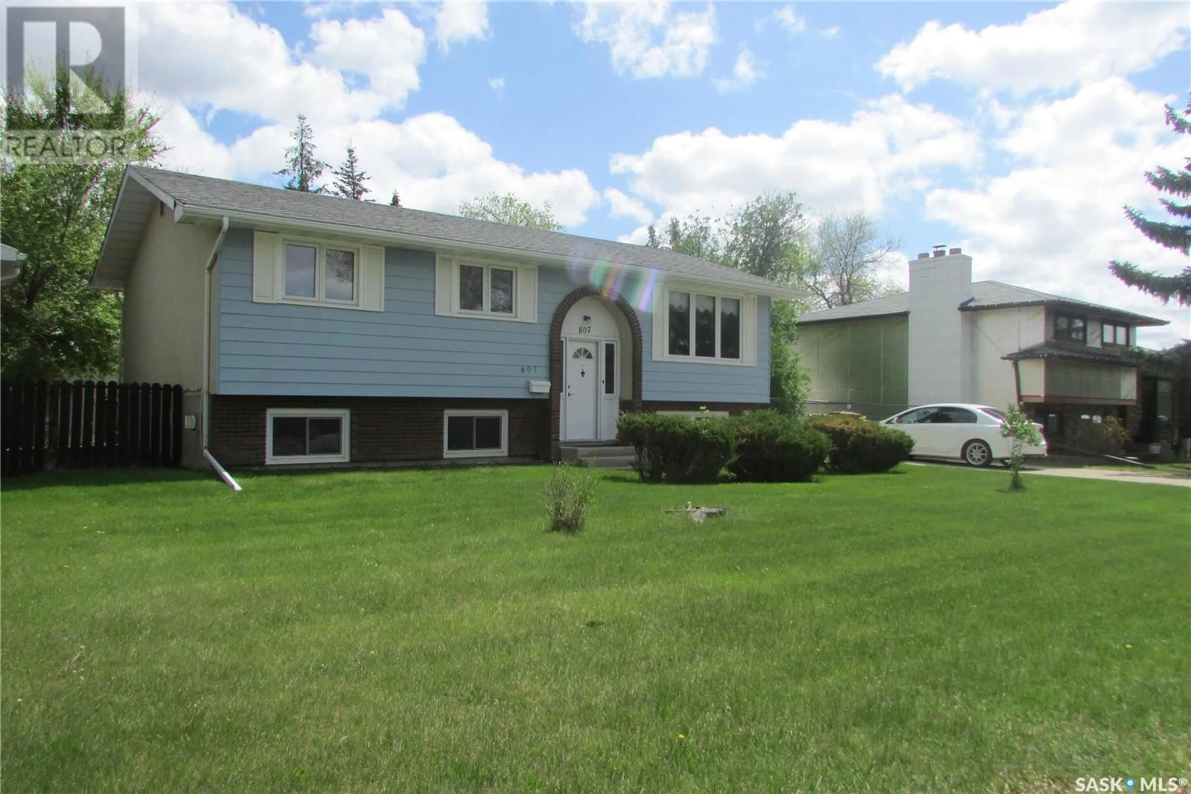 Home with vinyl exterior material, street for 807 MCINTOSH STREET, Regina Saskatchewan S4R6E4