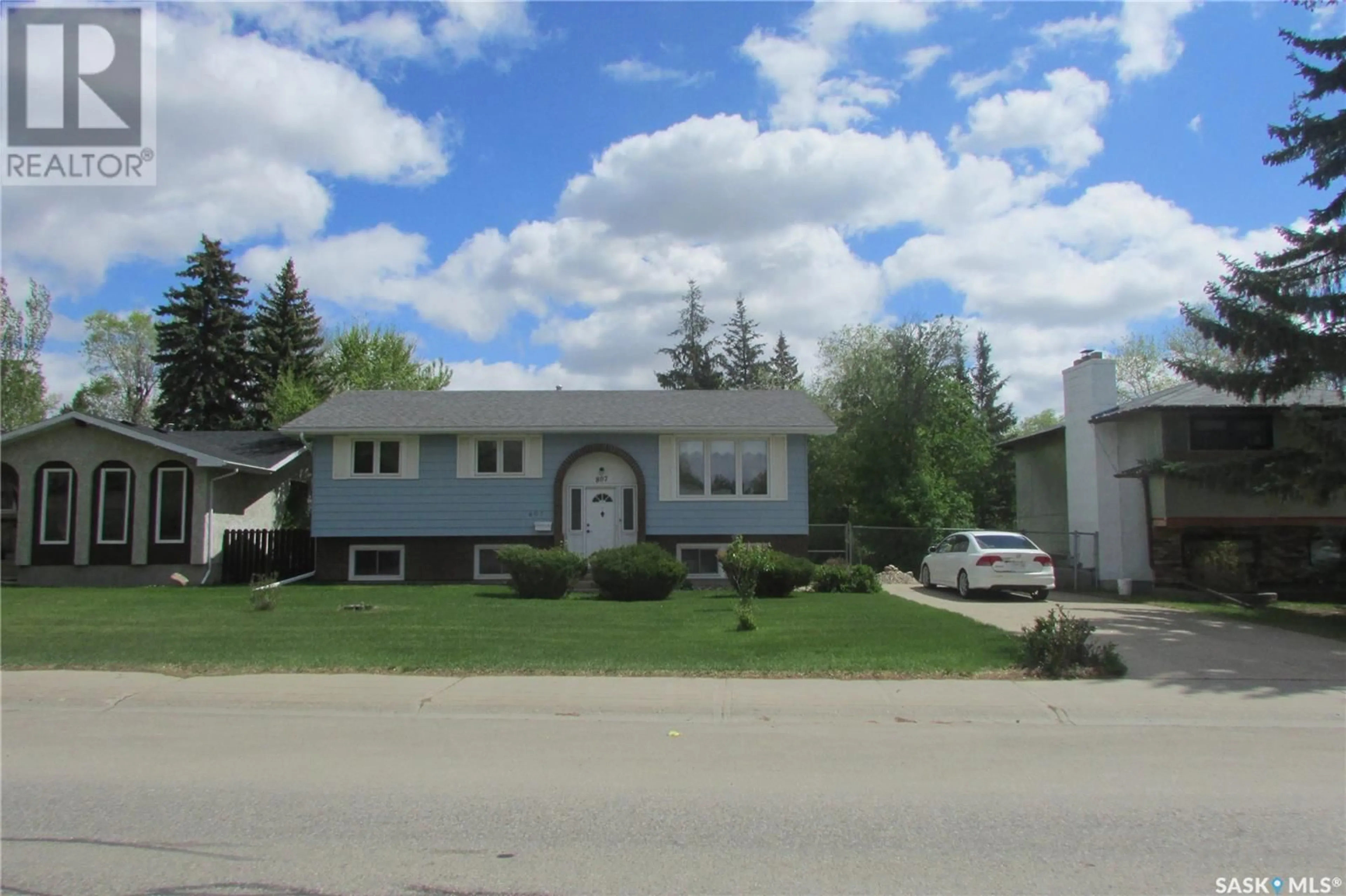 Home with vinyl exterior material, street for 807 MCINTOSH STREET, Regina Saskatchewan S4R6E4