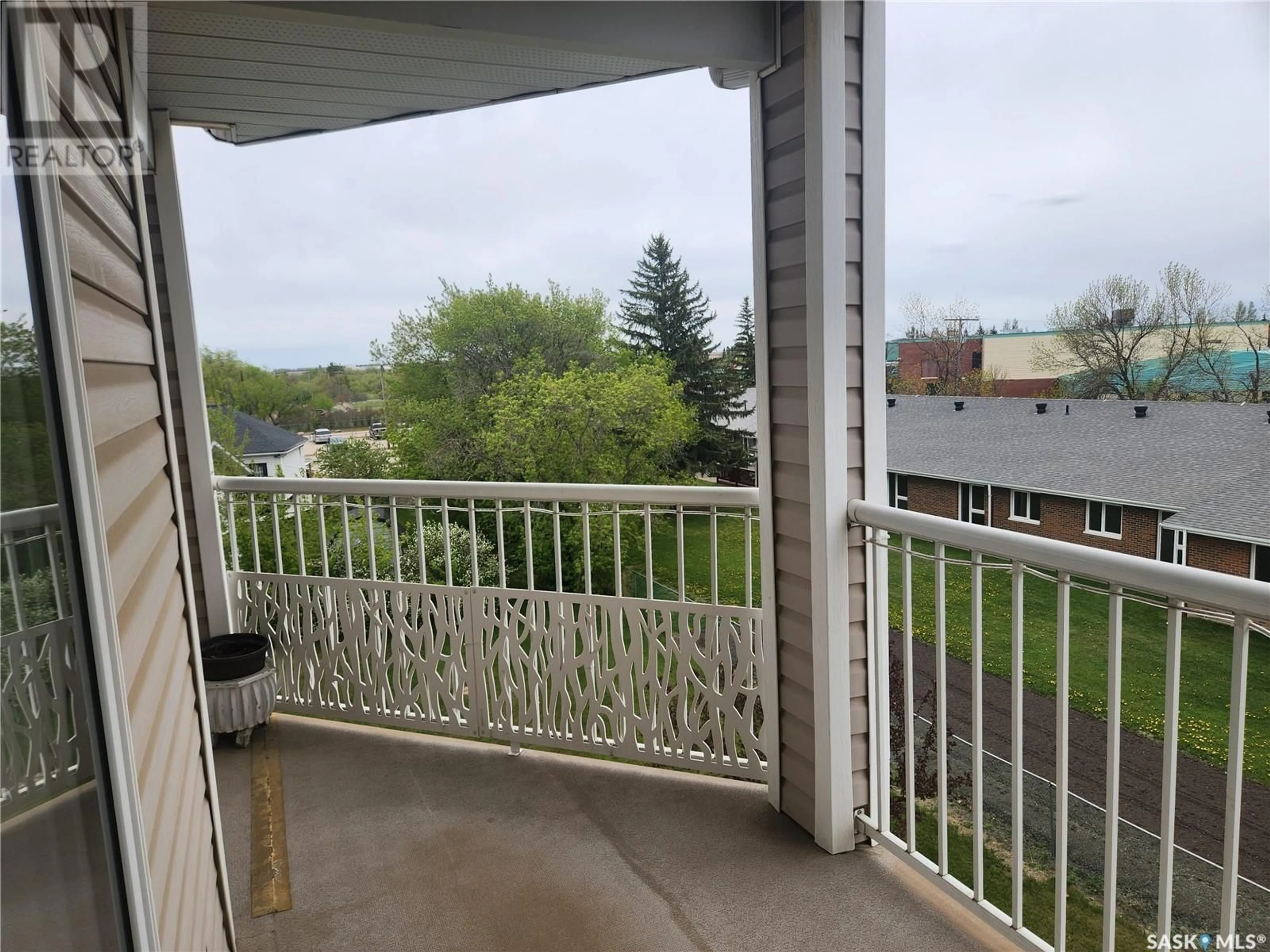 Balcony in the apartment, city buildings view from balcony for 304 - 100A 100 STREET, Tisdale Saskatchewan S0E1T0