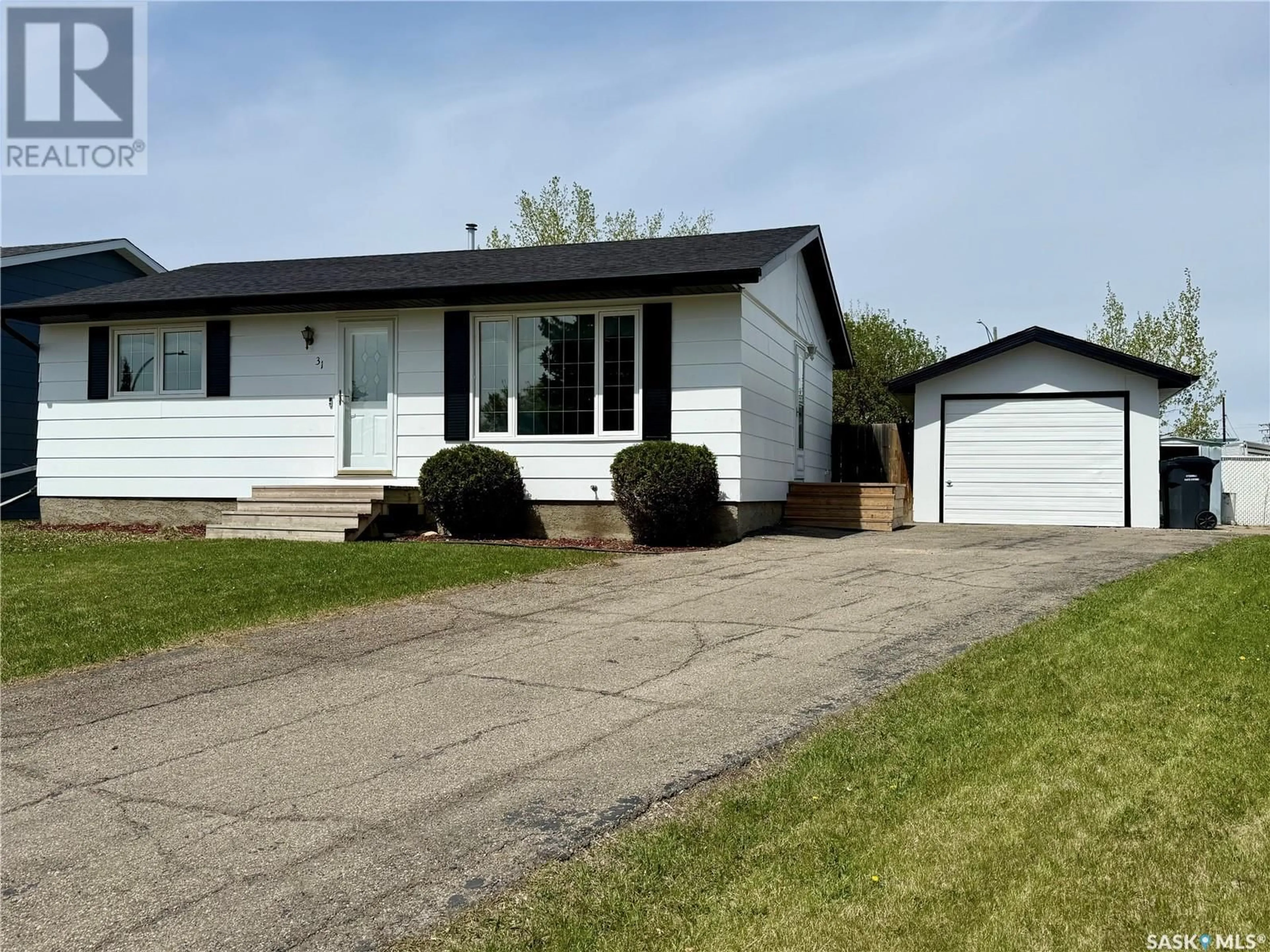 Home with vinyl exterior material, street for 31 COLLACOTT DRIVE, Yorkton Saskatchewan S3N3E5
