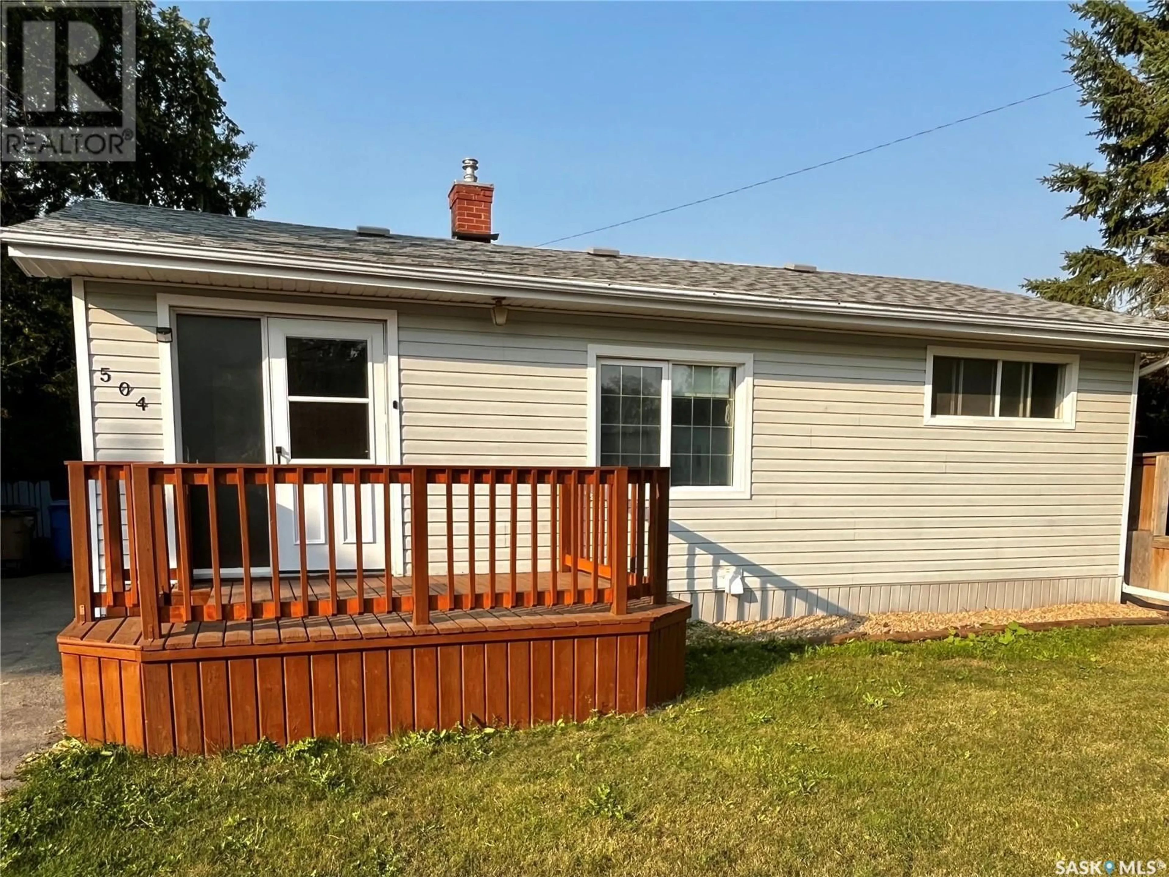 Home with vinyl exterior material, street for 504 STOVEL AVENUE, Melfort Saskatchewan S0E1A0