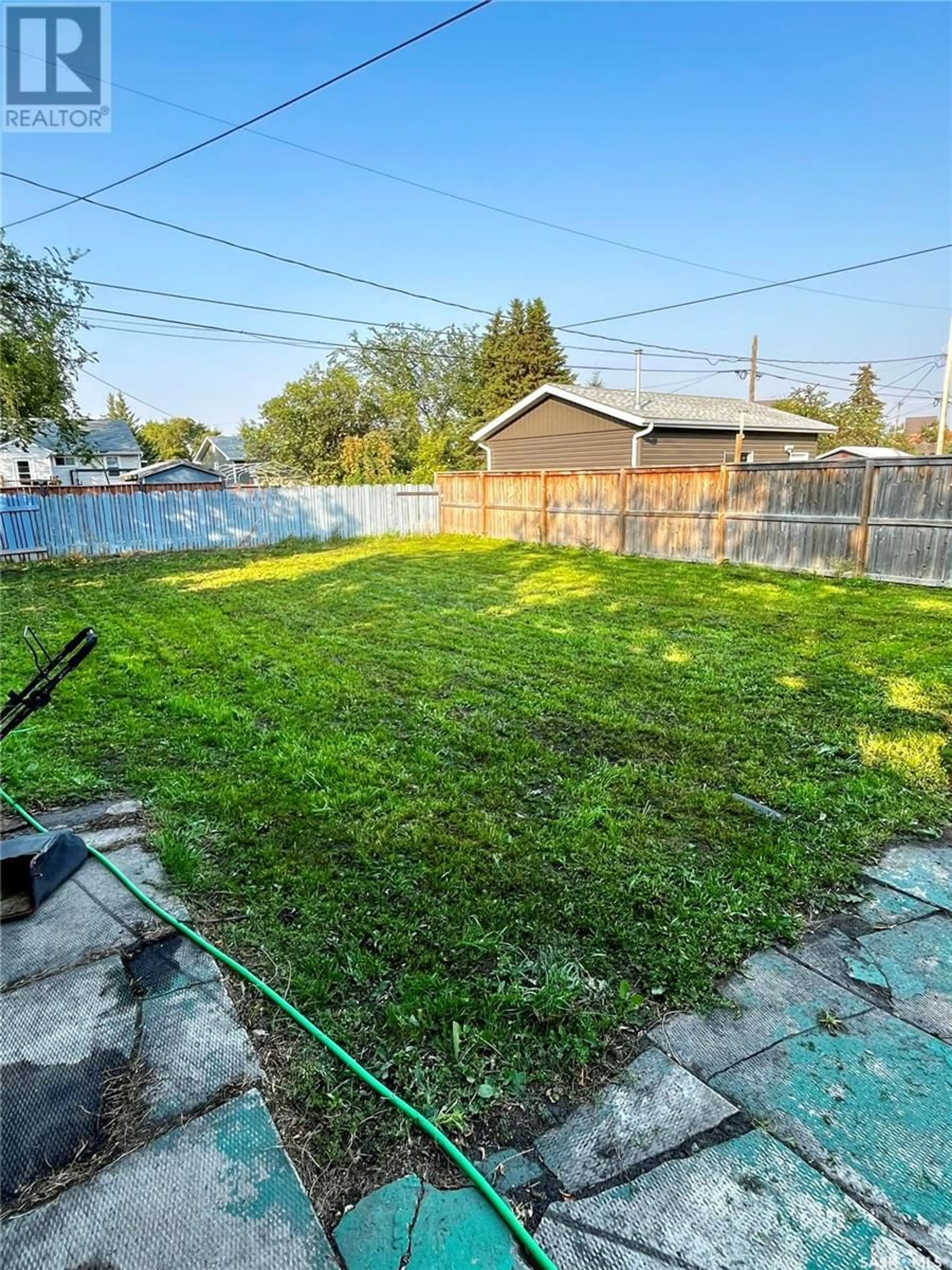 A pic from outside/outdoor area/front of a property/back of a property/a pic from drone, street for 504 STOVEL AVENUE, Melfort Saskatchewan S0E1A0