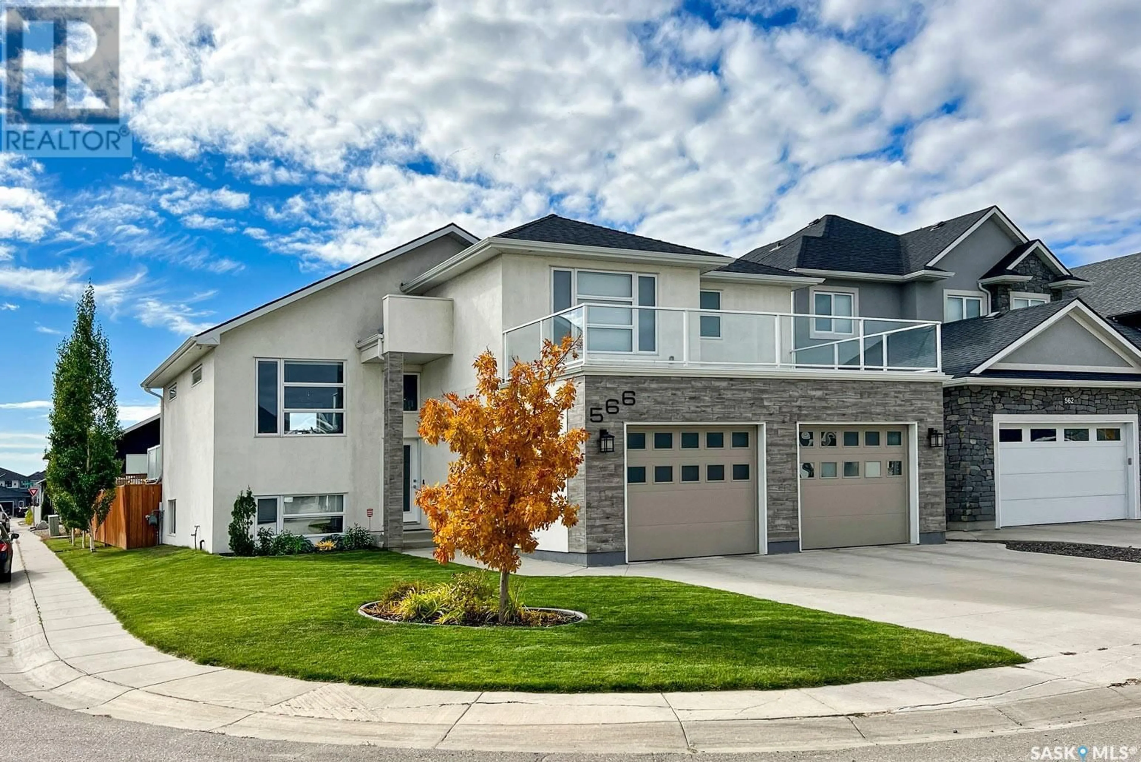 Home with vinyl exterior material, street for 566 BOYKOWICH CRESCENT, Saskatoon Saskatchewan S7W0S5