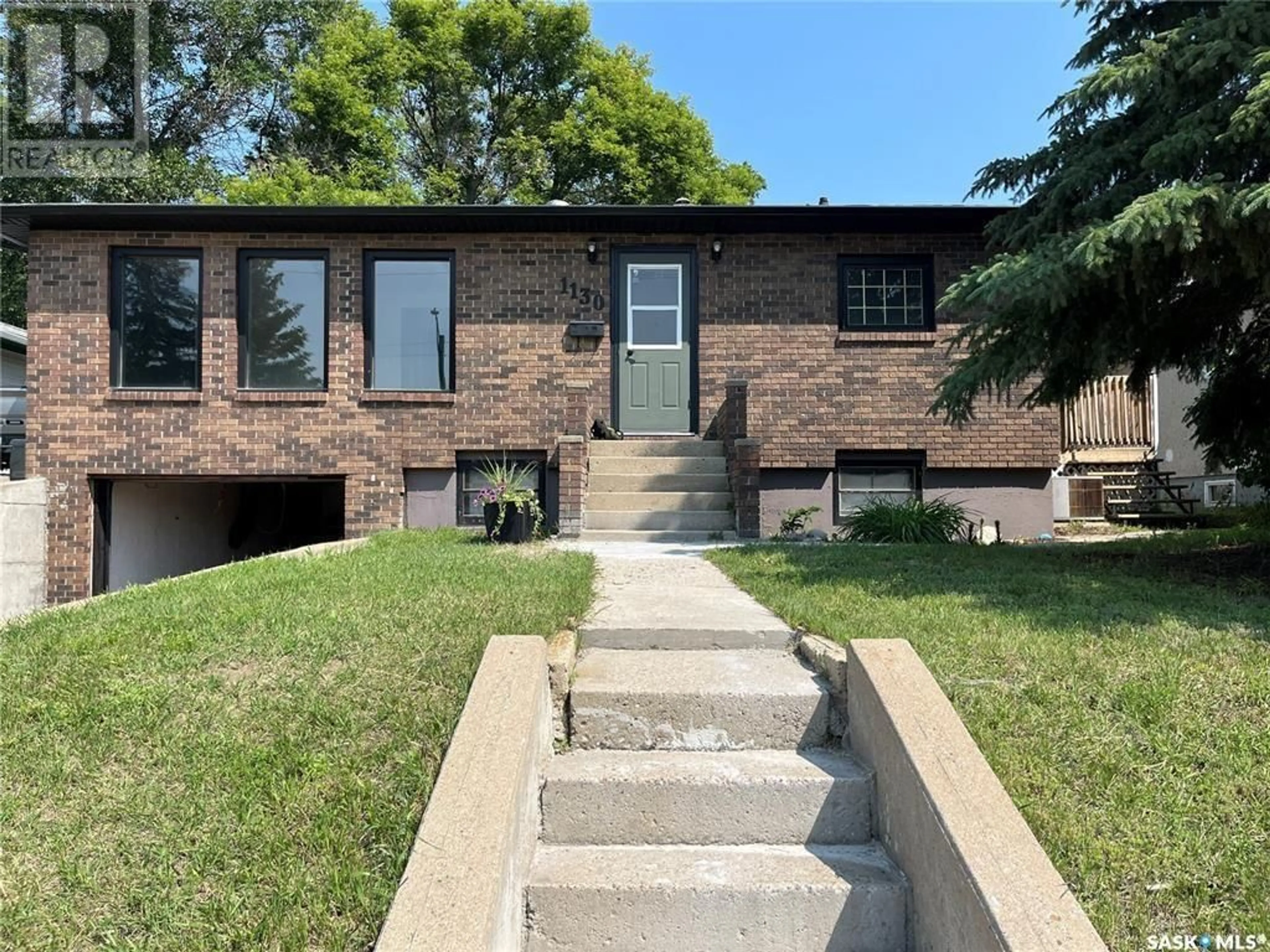 Home with brick exterior material, street for 1130 ATHABASCA STREET W, Moose Jaw Saskatchewan S6H2E7