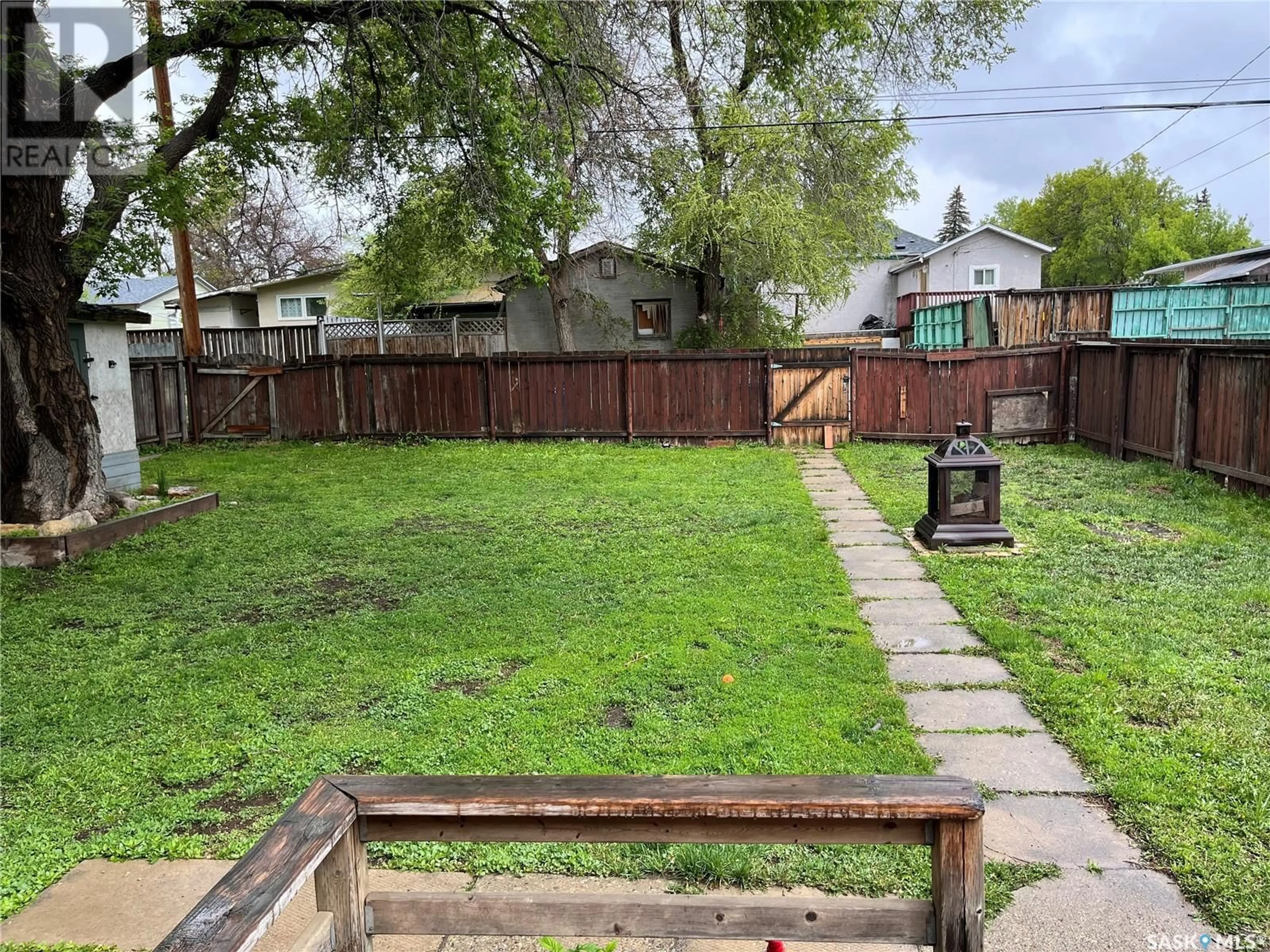 A pic from outside/outdoor area/front of a property/back of a property/a pic from drone, street for 1130 ATHABASCA STREET W, Moose Jaw Saskatchewan S6H2E7