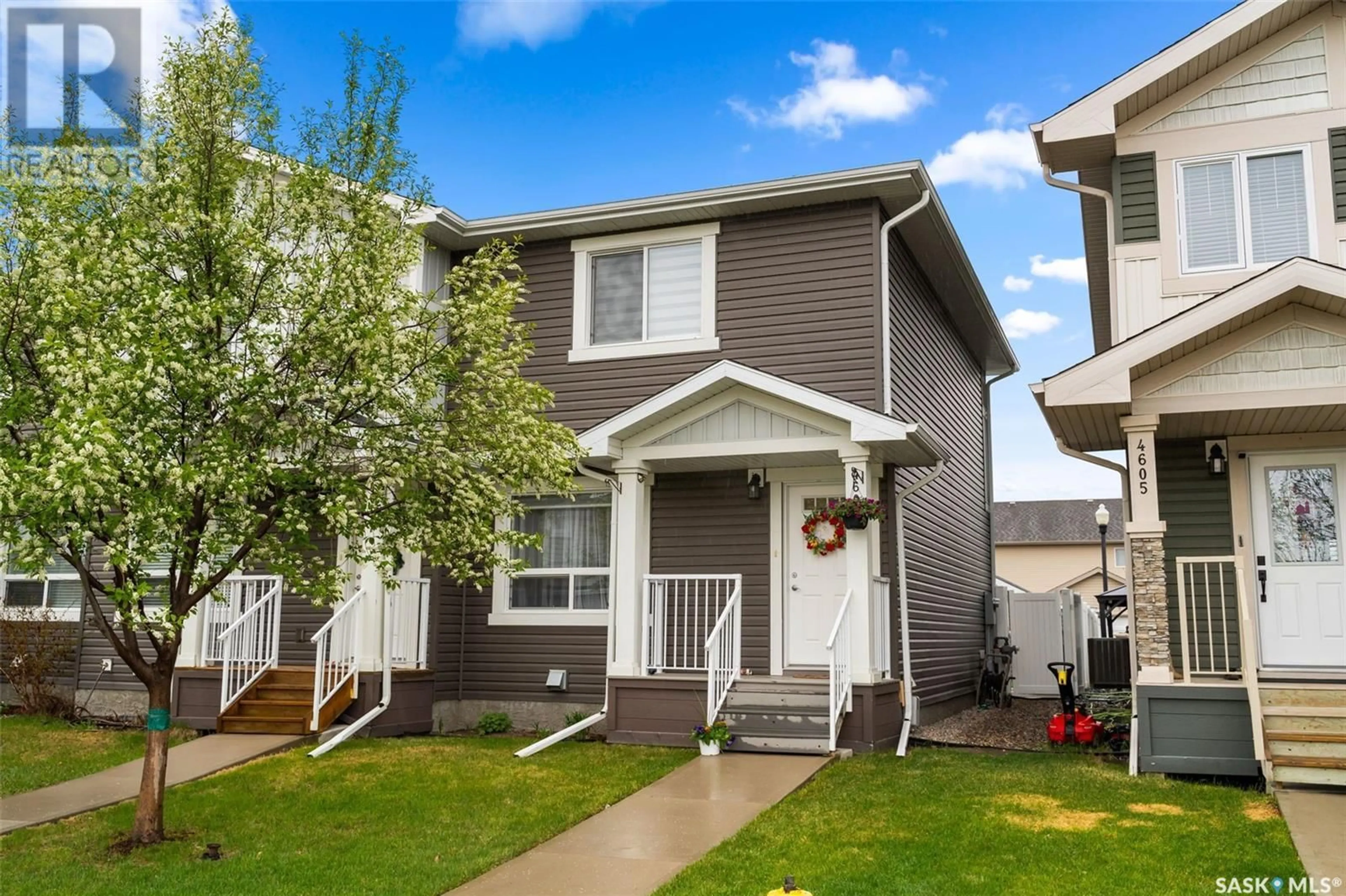 Home with vinyl exterior material, street for E - 4609 PRIMROSE GREEN DRIVE, Regina Saskatchewan S4V3K4
