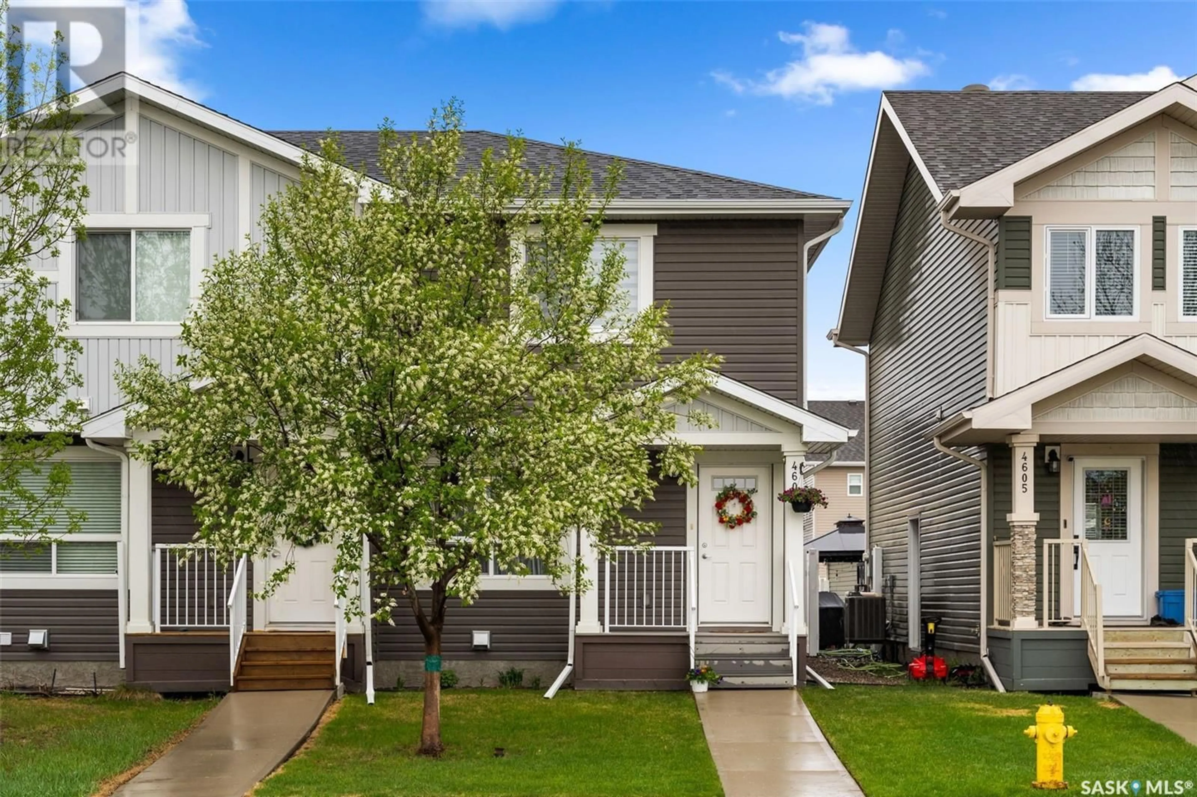Home with vinyl exterior material, street for E - 4609 PRIMROSE GREEN DRIVE, Regina Saskatchewan S4V3K4