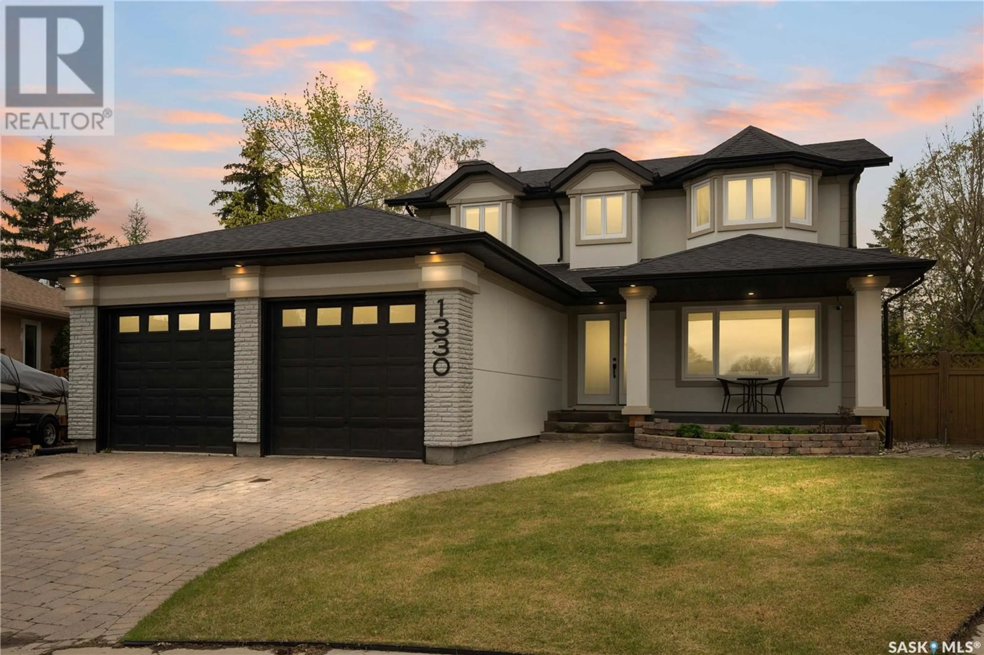 Home with vinyl exterior material, street for 1330 WASCANA HIGHLANDS, Regina Saskatchewan S4V2J9