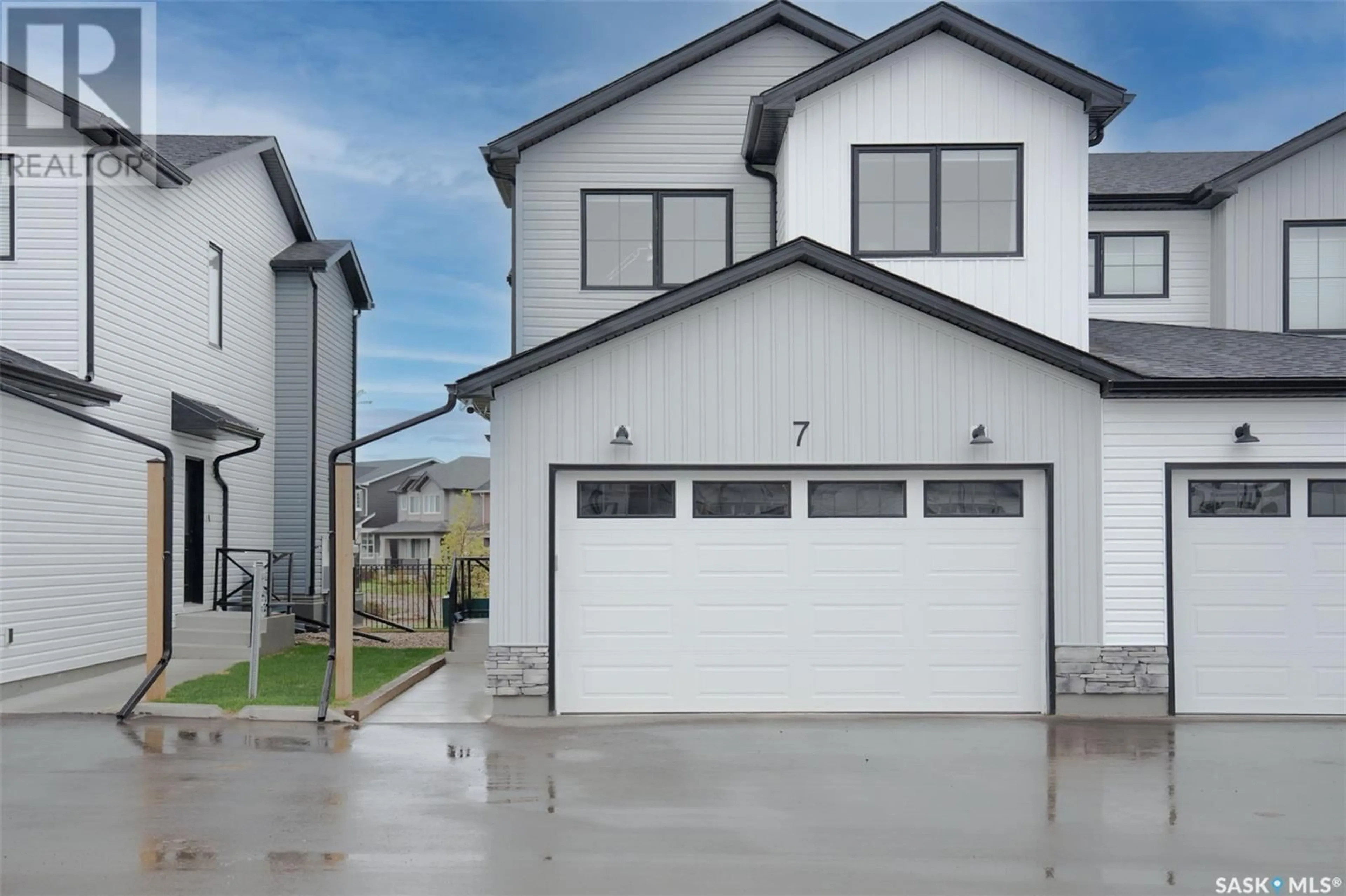 Home with vinyl exterior material, street for 7 DAGNONE CRESCENT, Saskatoon Saskatchewan S7V1K9