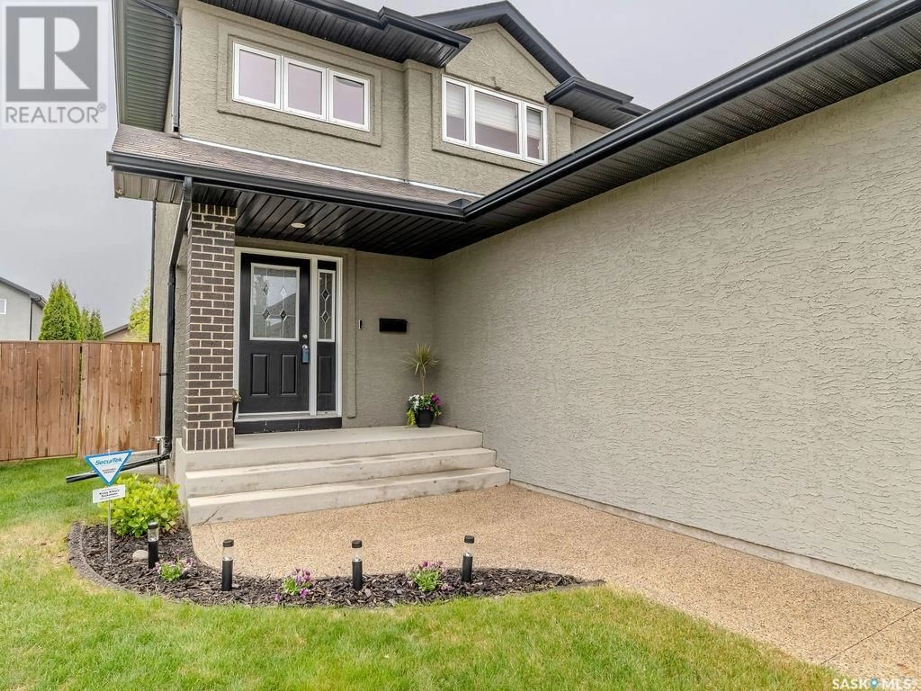 Home with brick exterior material, street for 110 ALM CRESCENT, Saskatoon Saskatchewan S7T0E1