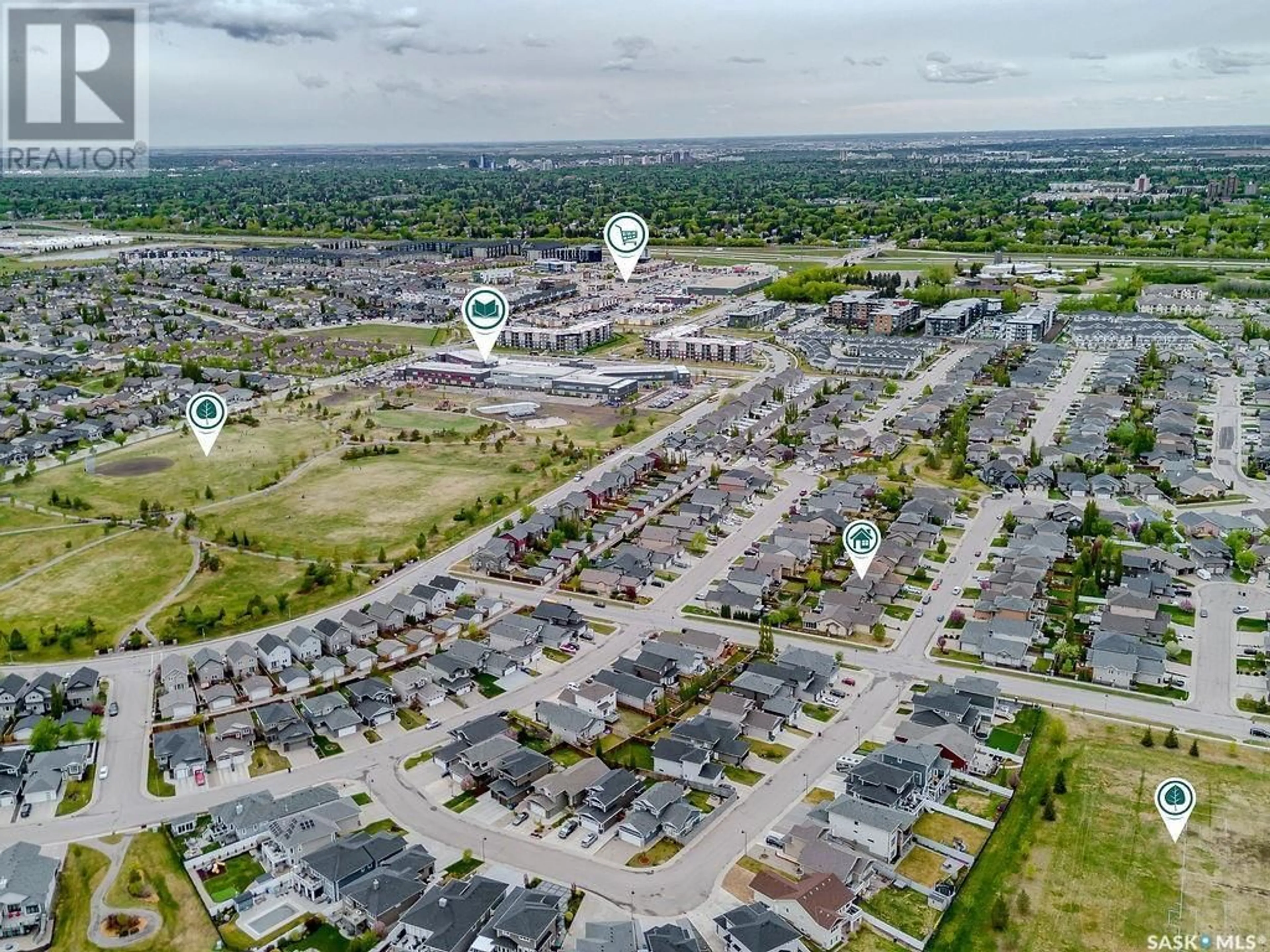 A pic from outside/outdoor area/front of a property/back of a property/a pic from drone, street for 110 ALM CRESCENT, Saskatoon Saskatchewan S7T0E1