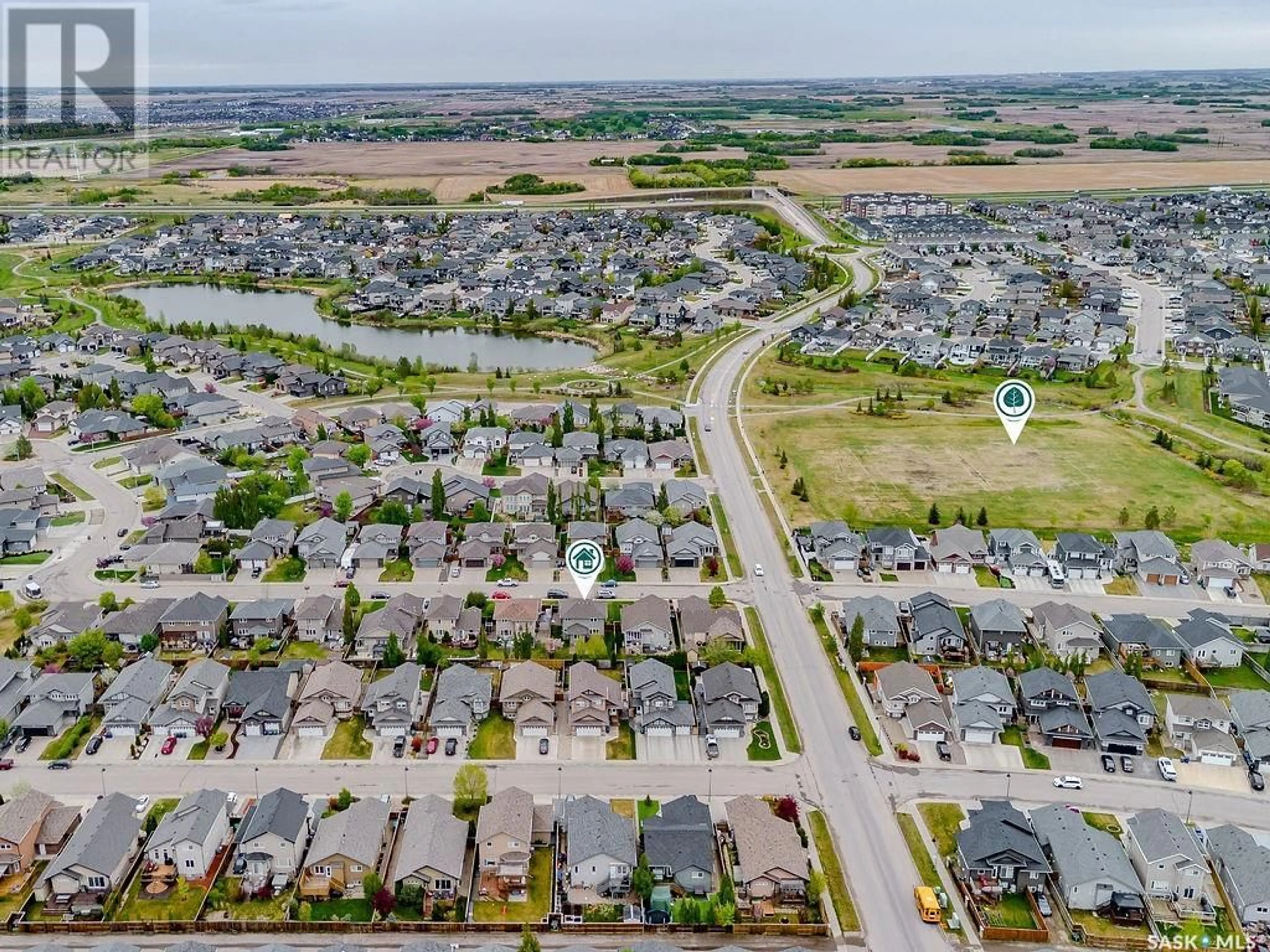 A pic from outside/outdoor area/front of a property/back of a property/a pic from drone, street for 110 ALM CRESCENT, Saskatoon Saskatchewan S7T0E1