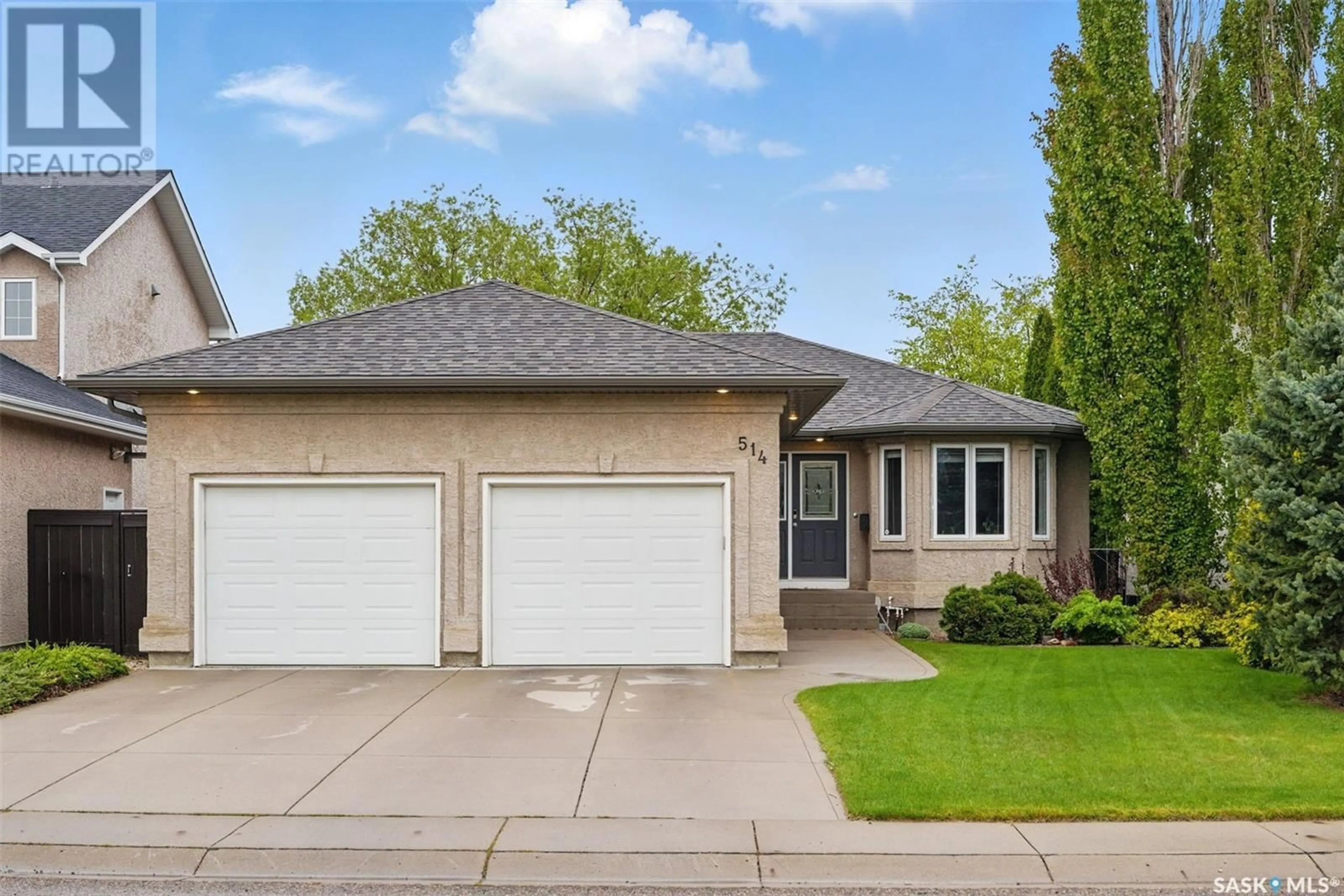 Home with vinyl exterior material, street for 514 BLACKBURN CRESCENT, Saskatoon Saskatchewan S7V1E8