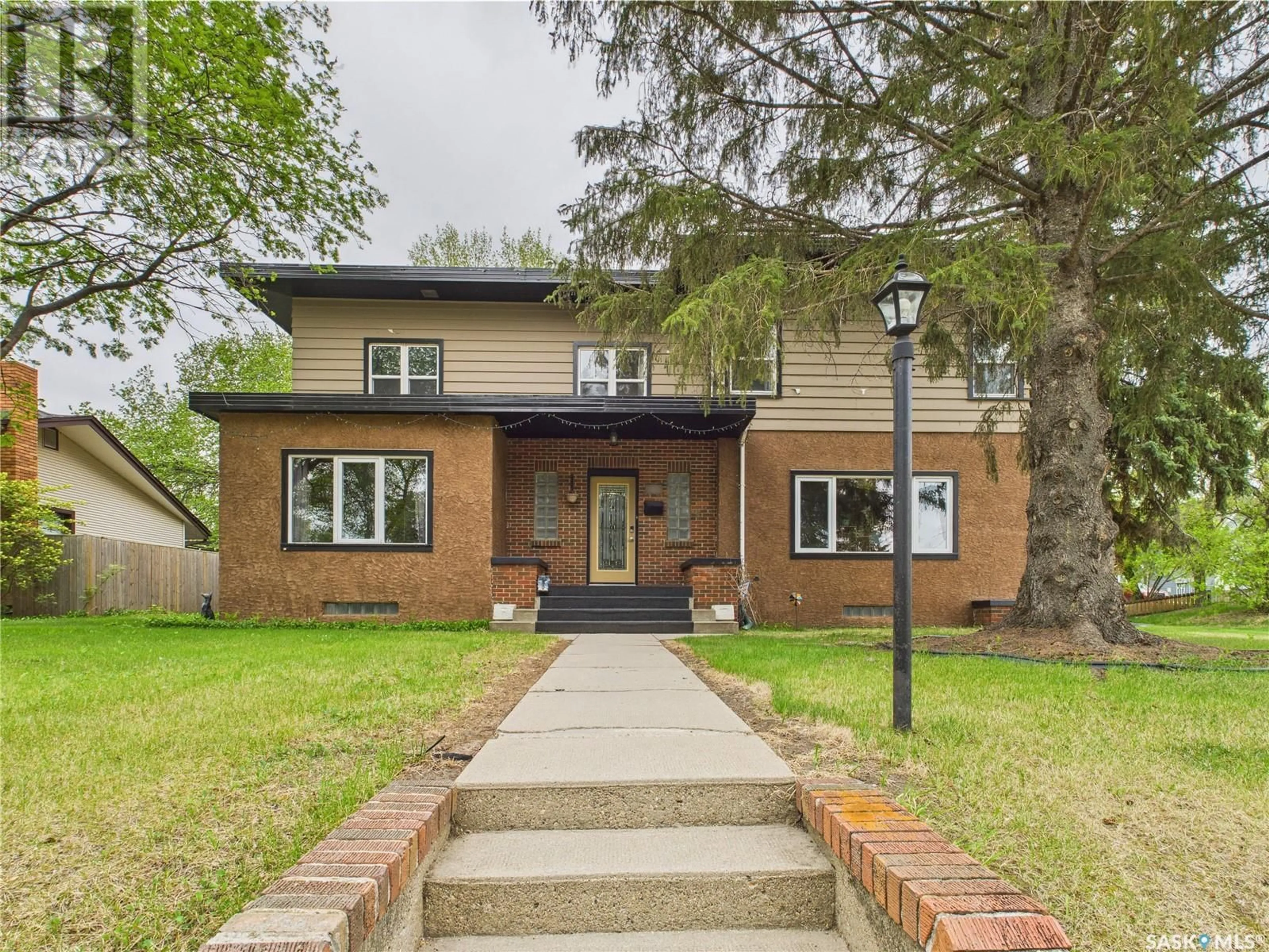 Home with brick exterior material, street for 427 21ST STREET, Prince Albert Saskatchewan S6V4J5