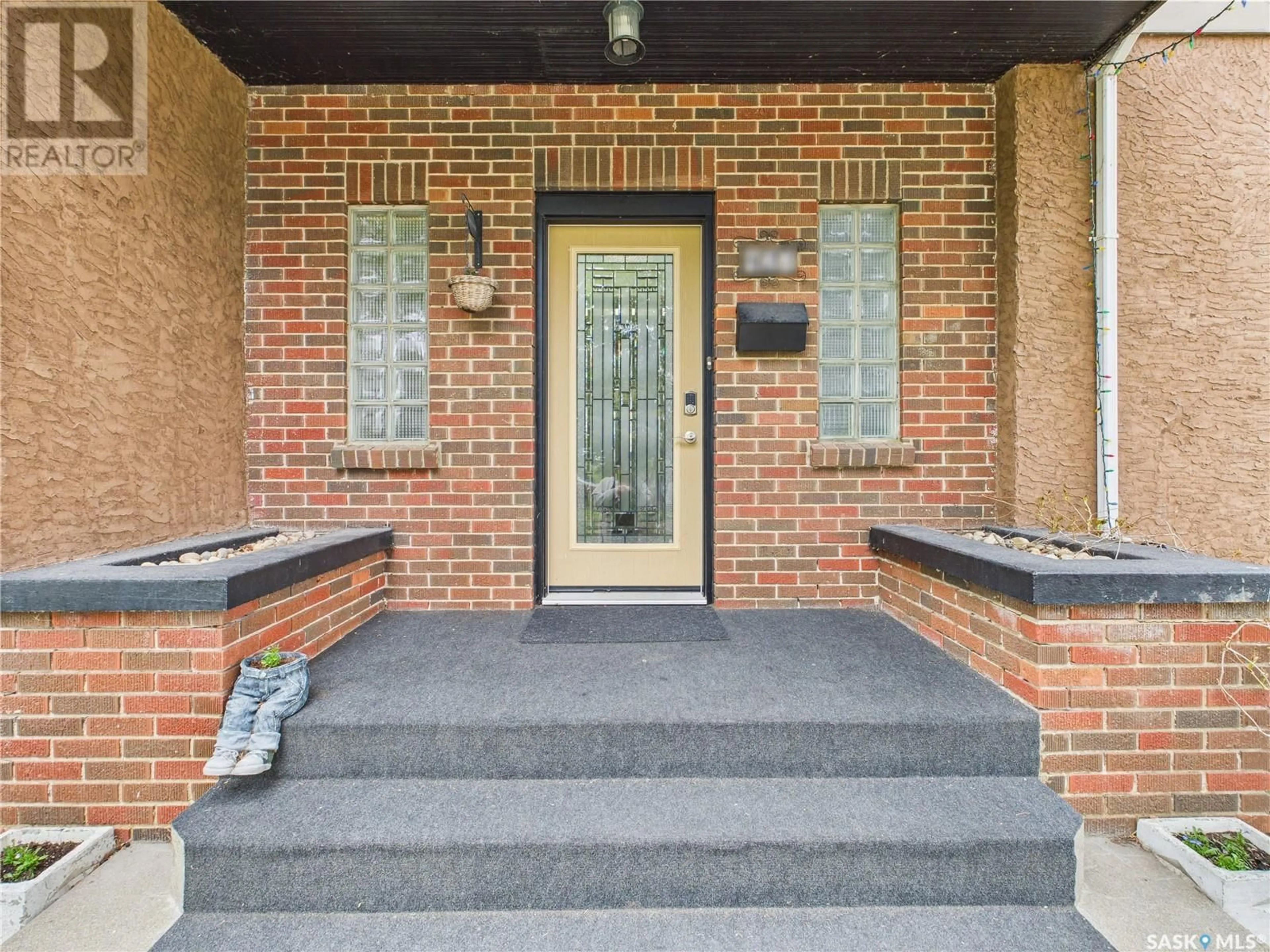 Home with brick exterior material, street for 427 21ST STREET, Prince Albert Saskatchewan S6V4J5
