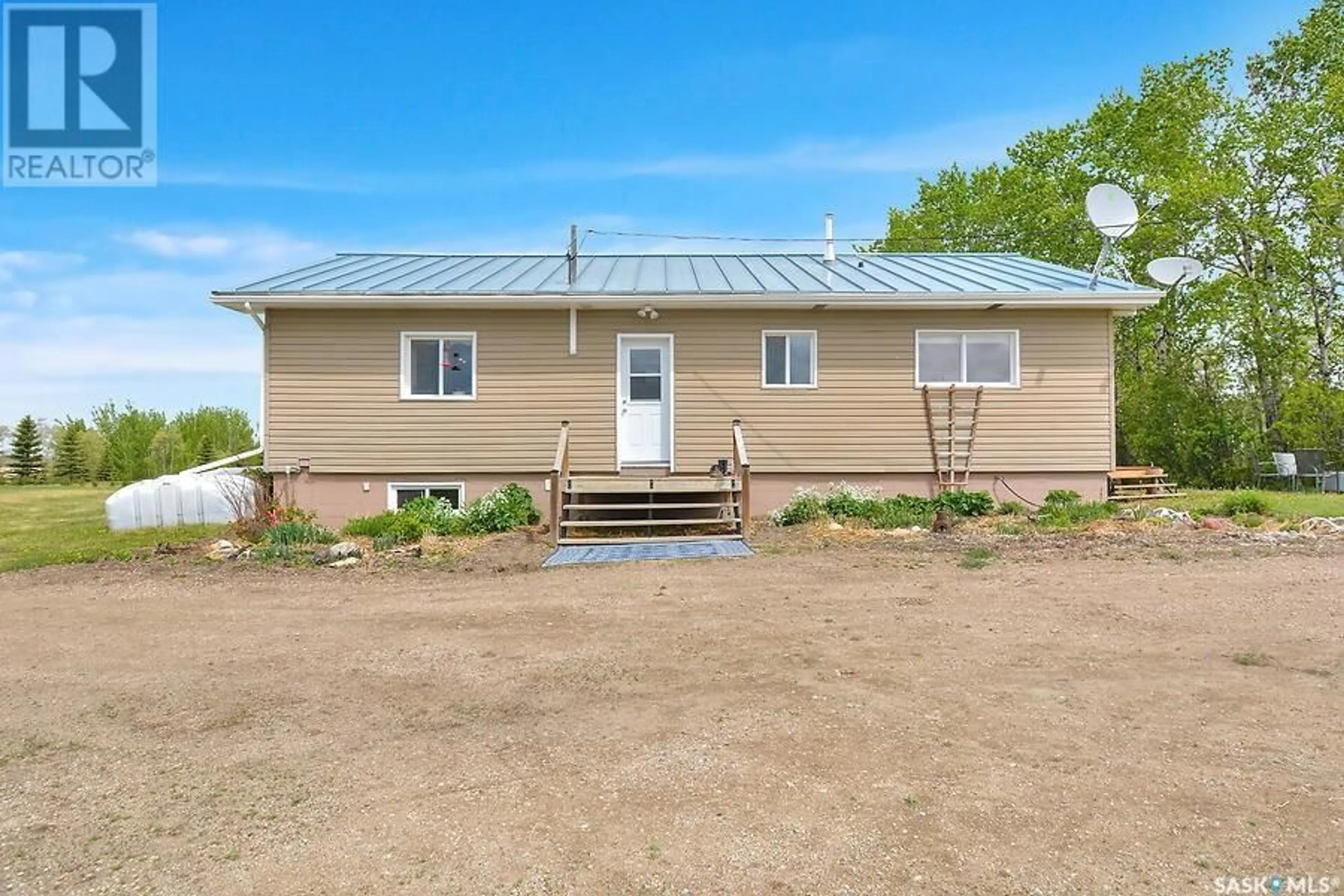 A pic from outside/outdoor area/front of a property/back of a property/a pic from drone, building for HALTER ACREAGE, Fish Creek Rm No. 402 Saskatchewan S0K0E0
