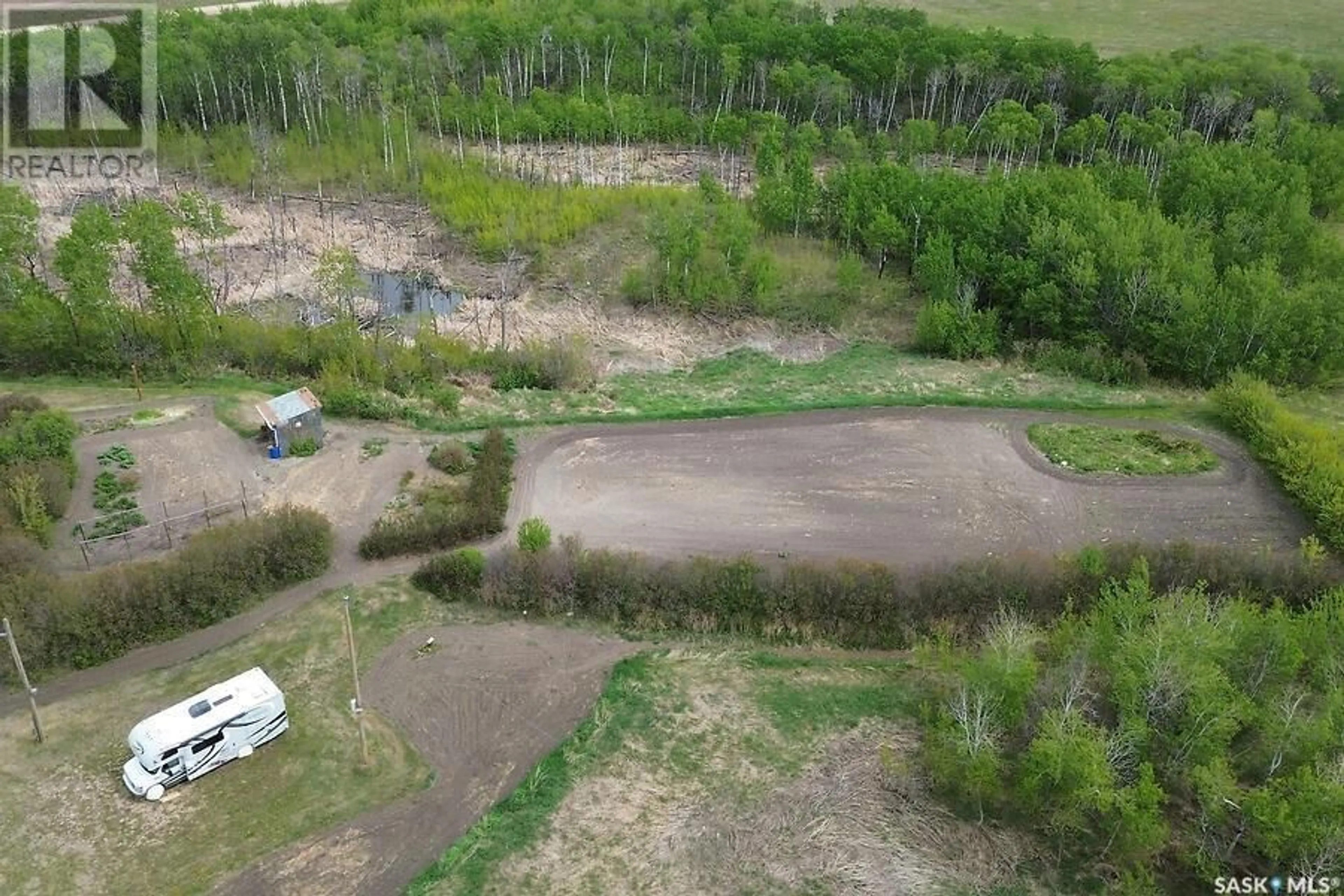 A pic from outside/outdoor area/front of a property/back of a property/a pic from drone, forest/trees view for HALTER ACREAGE, Fish Creek Rm No. 402 Saskatchewan S0K0E0