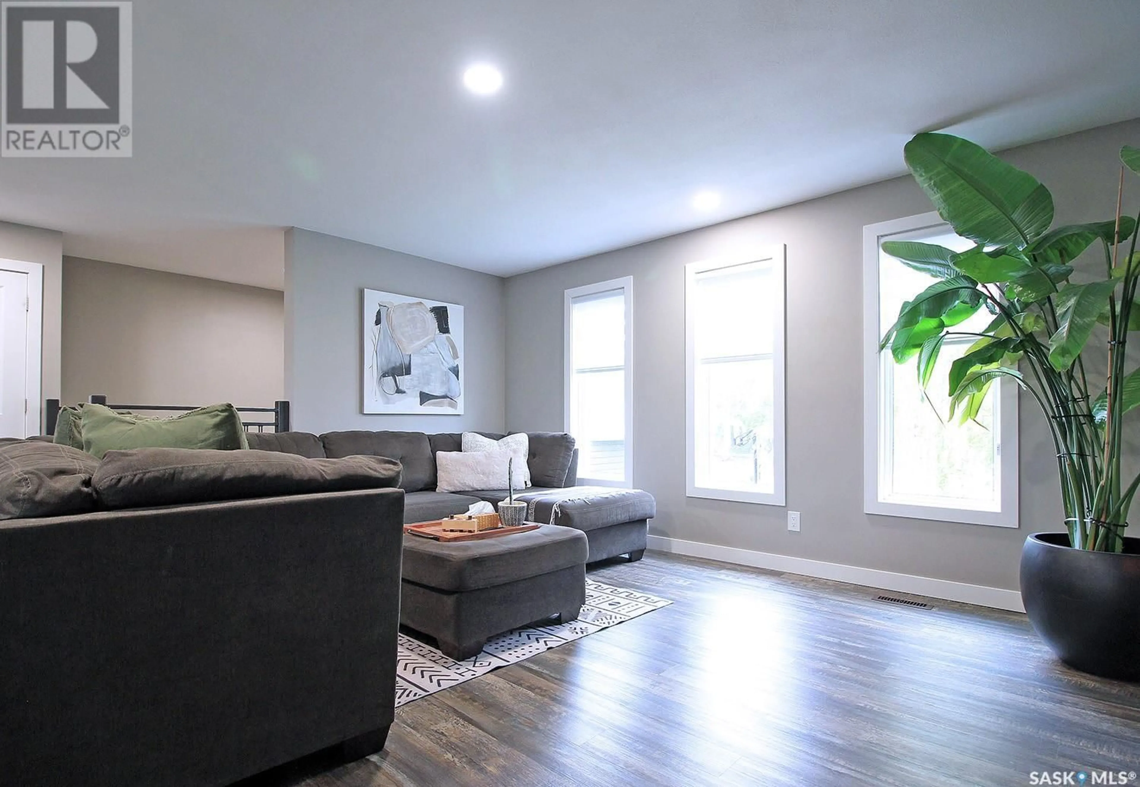 Living room with furniture, wood/laminate floor for 69 BIGGS CRESCENT, Yorkton Saskatchewan S3N3V9