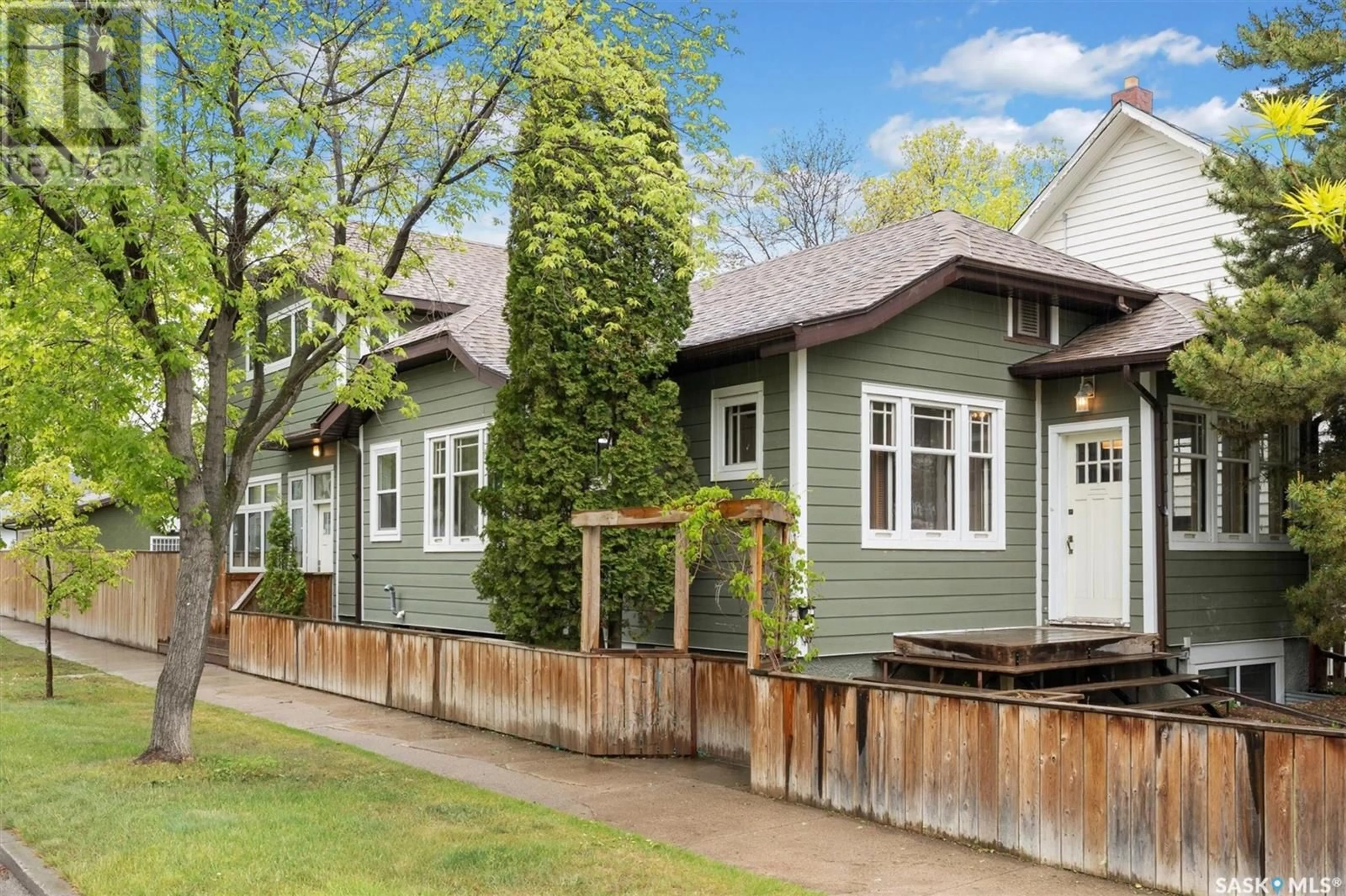 Home with vinyl exterior material, street for 619 CLARENCE AVENUE, Saskatoon Saskatchewan S7H2E1