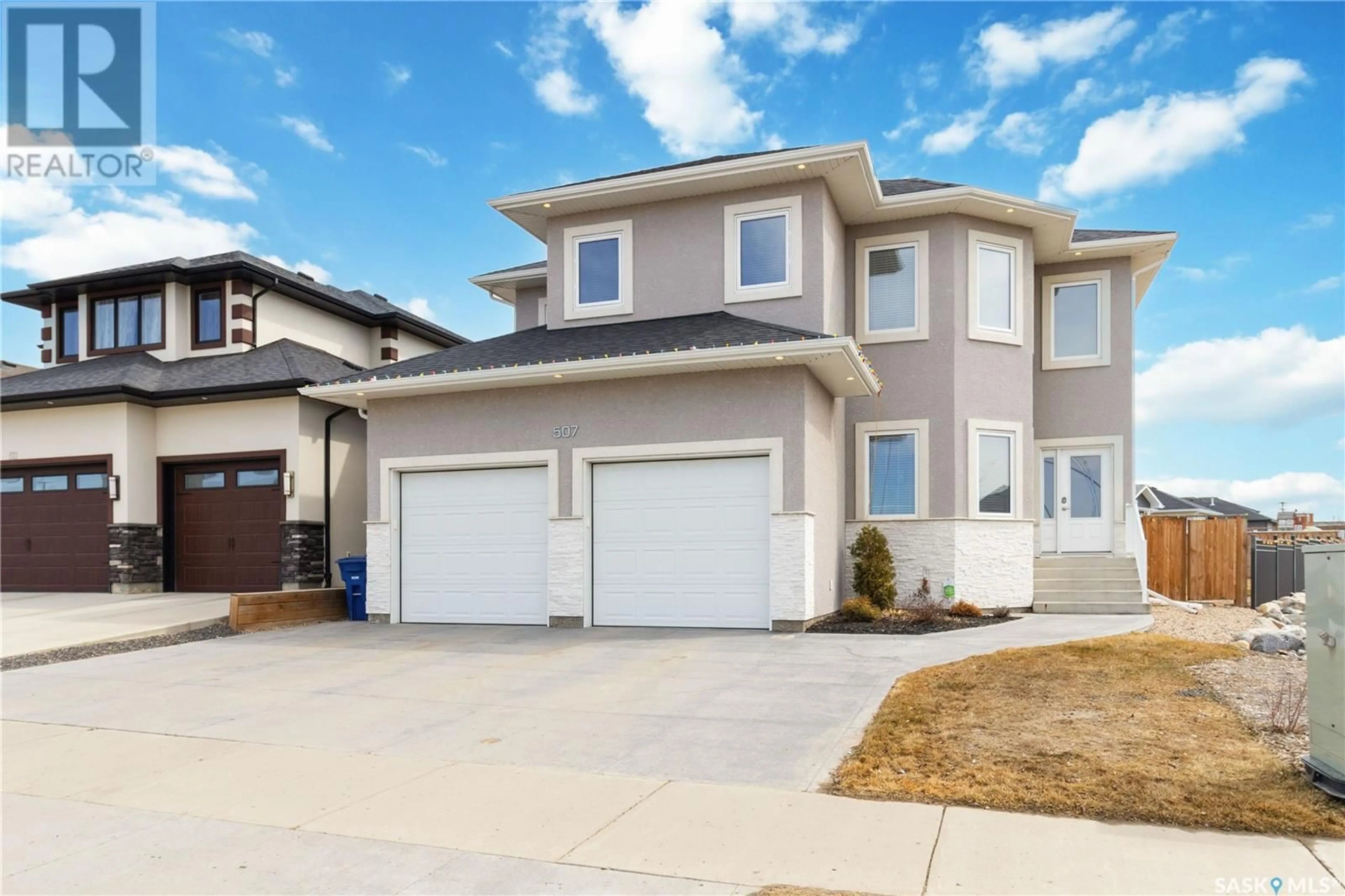 Home with vinyl exterior material, street for 507 MANEK ROAD, Saskatoon Saskatchewan S7W0R7