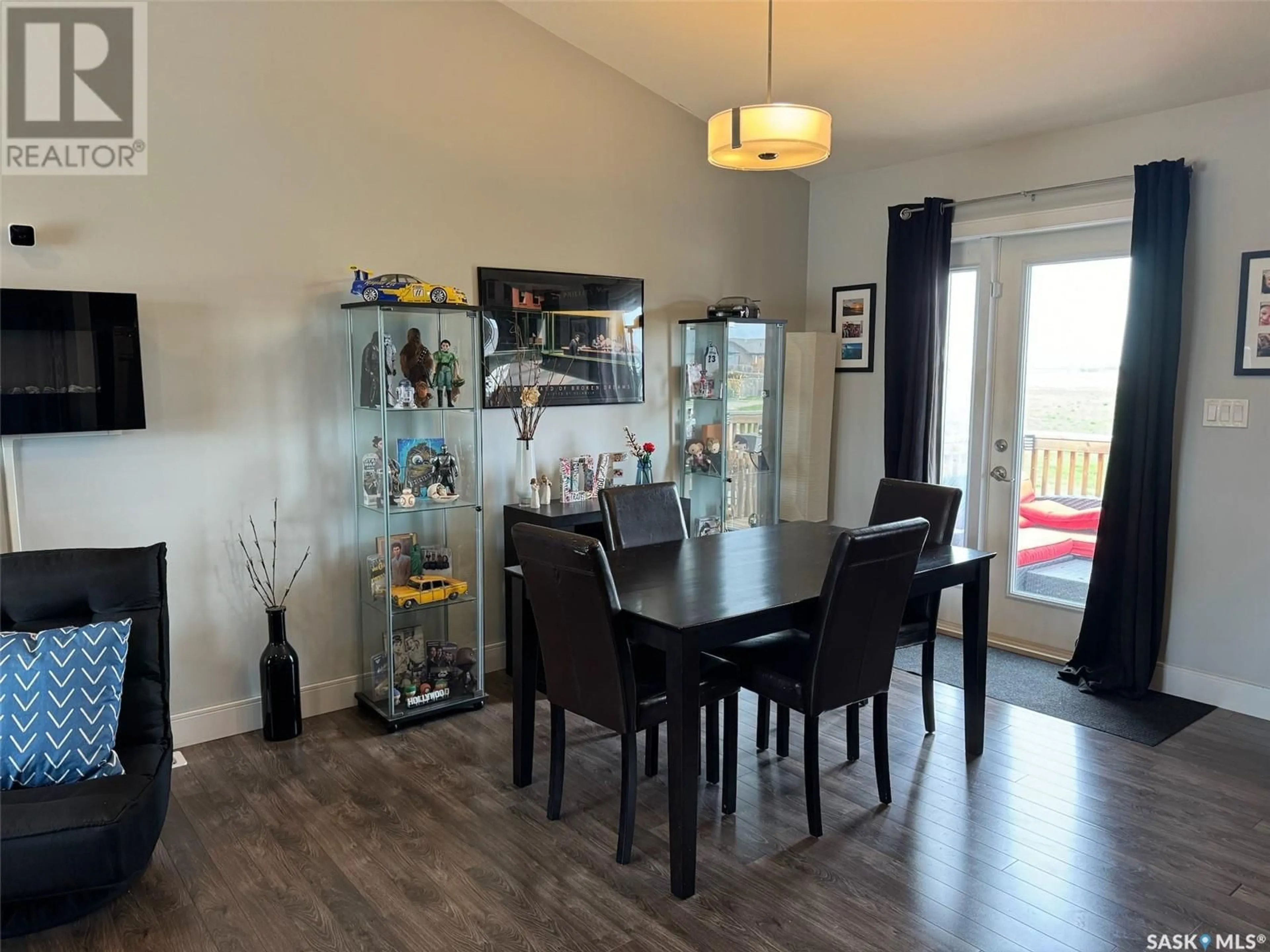 Dining room, wood/laminate floor for 116 OLAUSON CRESCENT, Vanscoy Saskatchewan S0L3J0