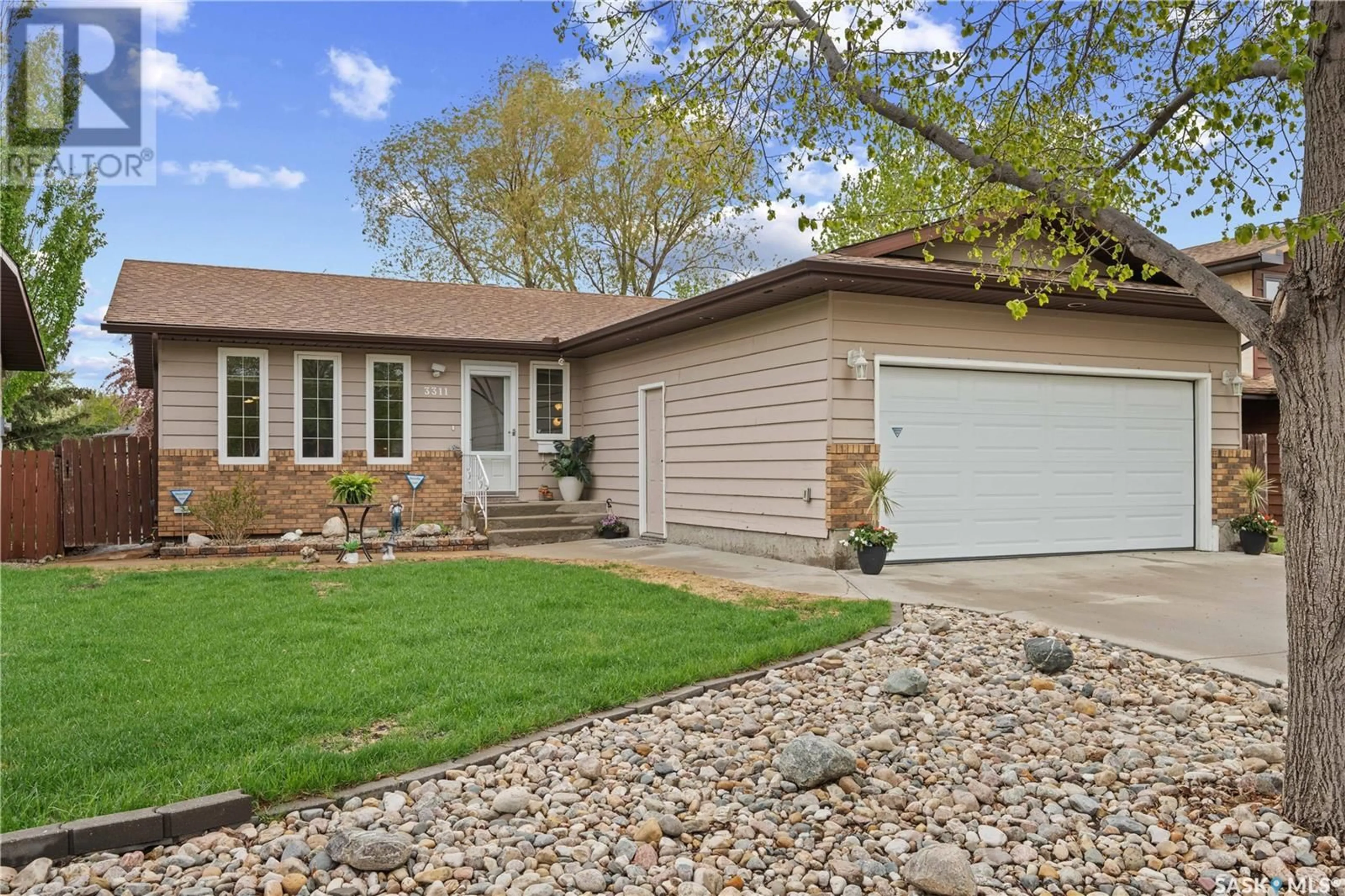 Home with vinyl exterior material, street for 3311 PARKLAND DRIVE, Regina Saskatchewan S4V1V8