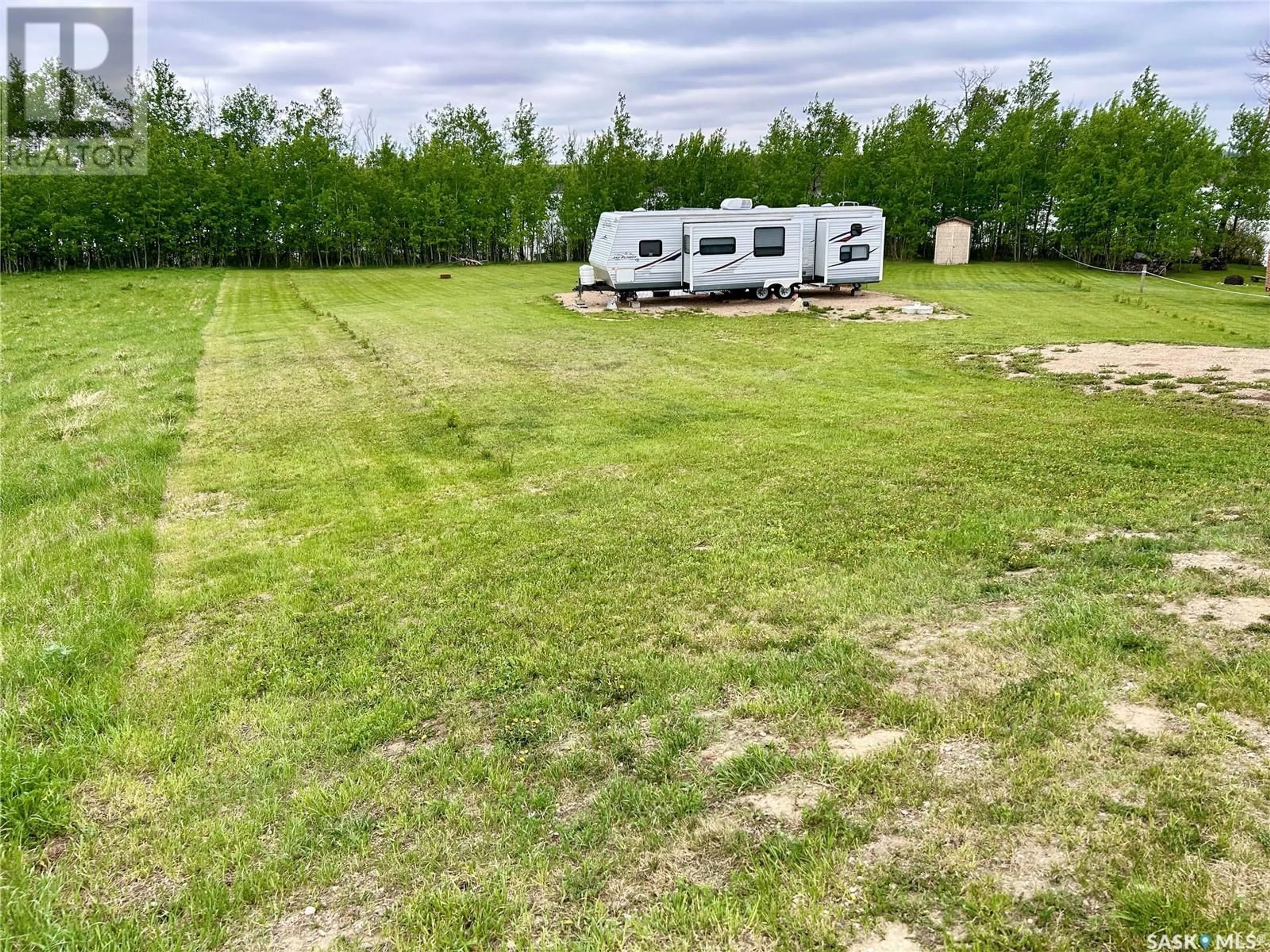 A pic from outside/outdoor area/front of a property/back of a property/a pic from drone, unknown for 228 BOUCHARD LANE, Dixon Lake Saskatchewan S0X1A0