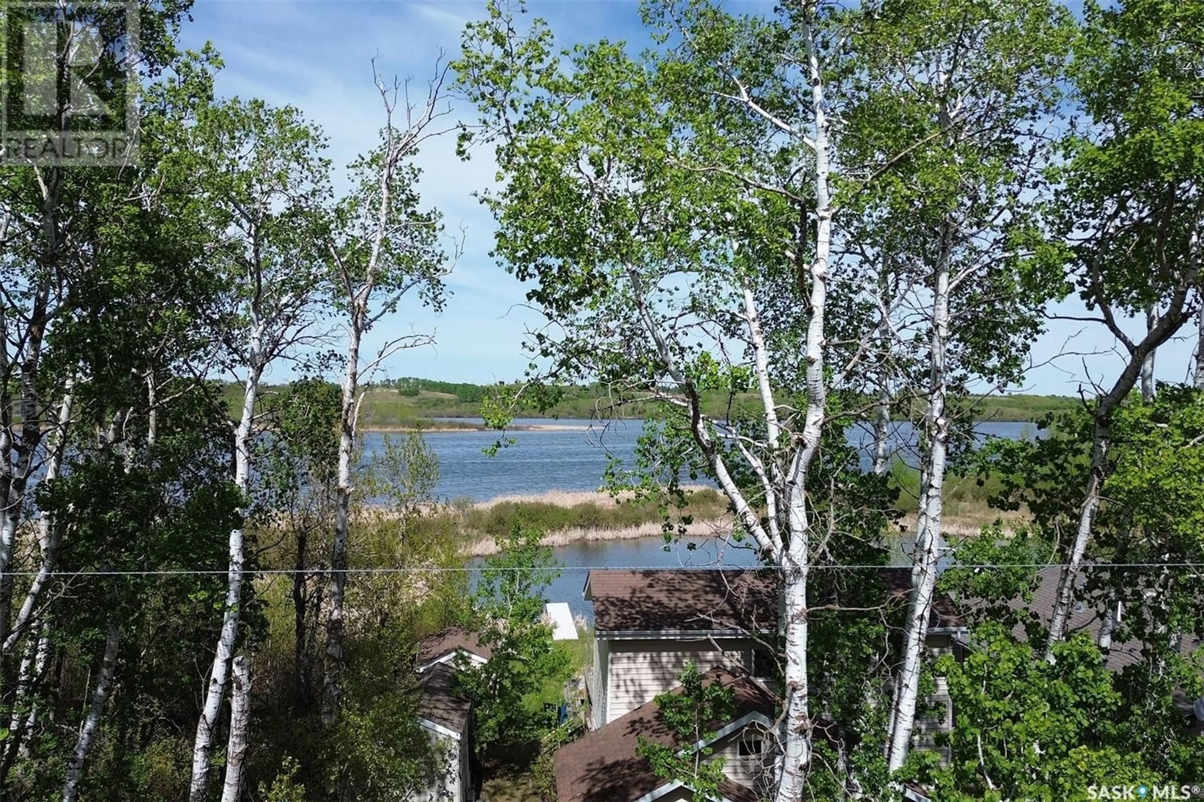 A pic from outside/outdoor area/front of a property/back of a property/a pic from drone, water/lake/river/ocean view for 3639 SCHITKA BEACH DRIVE, Wakaw Lake Saskatchewan S0K4P0