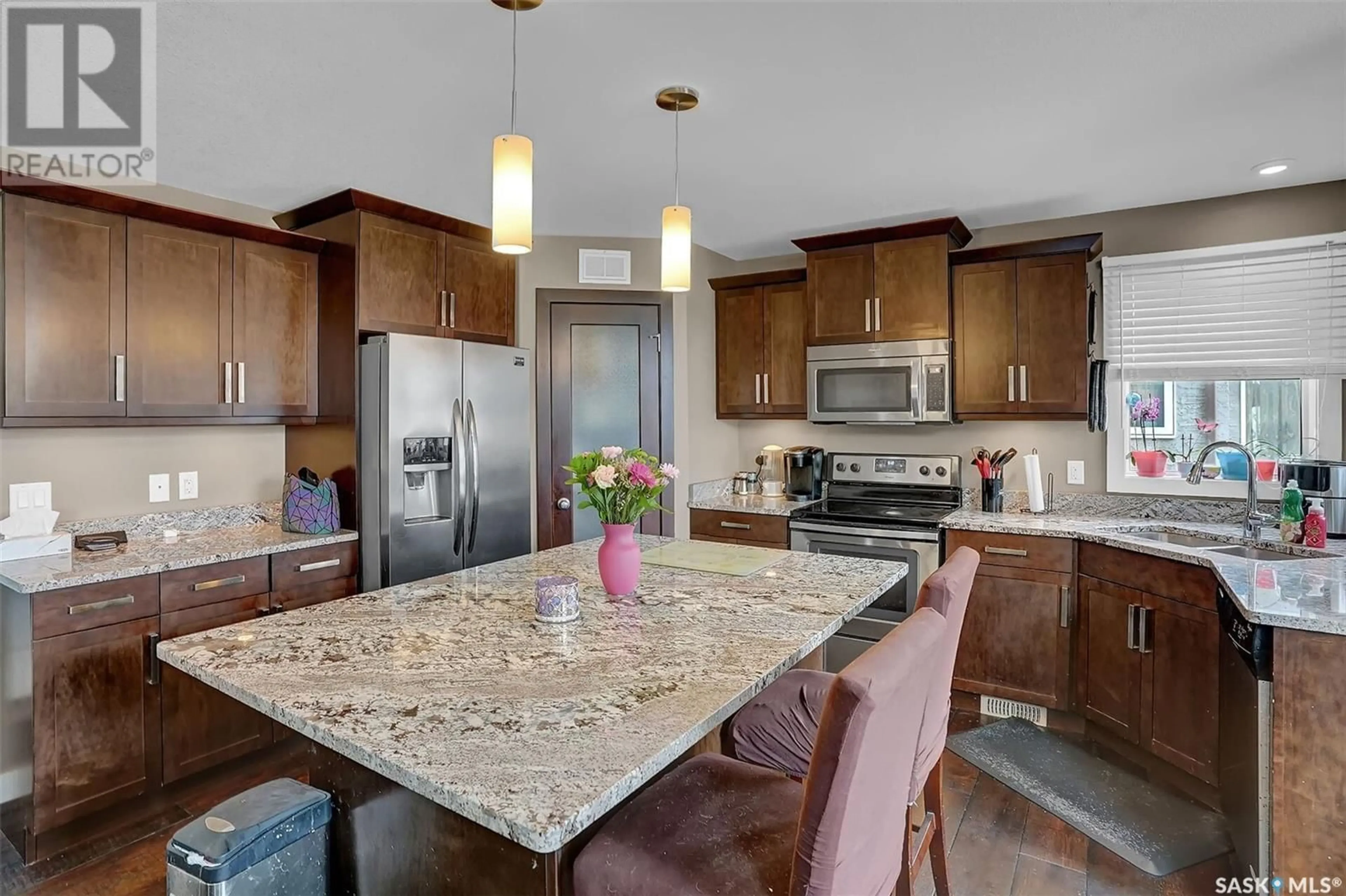 Open concept kitchen, ceramic/tile floor for 3865 GREEN MOSS BAY, Regina Saskatchewan S4V1P7