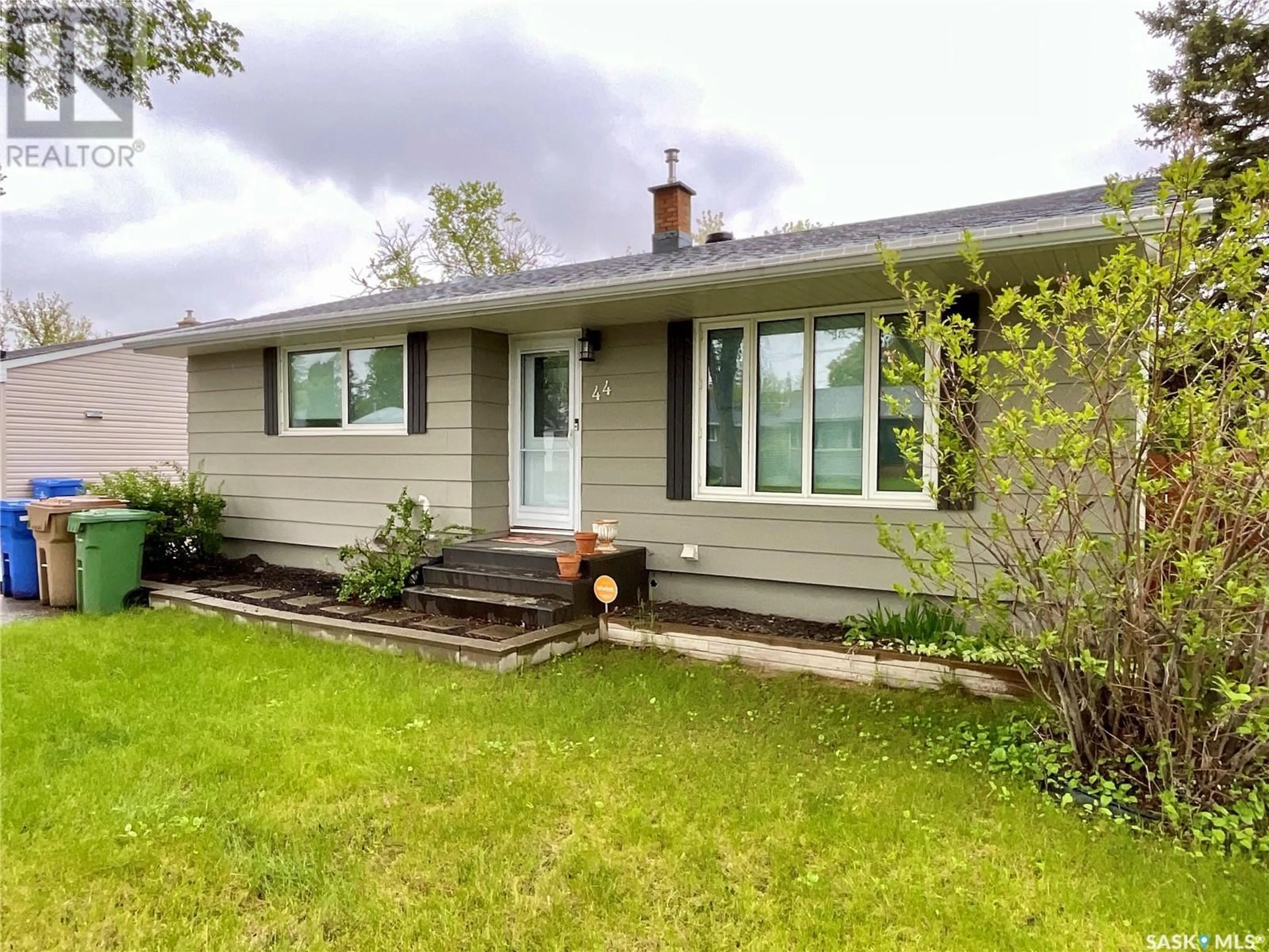 Home with vinyl exterior material, street for 44 GALE STREET, Regina Saskatchewan S4R4E1