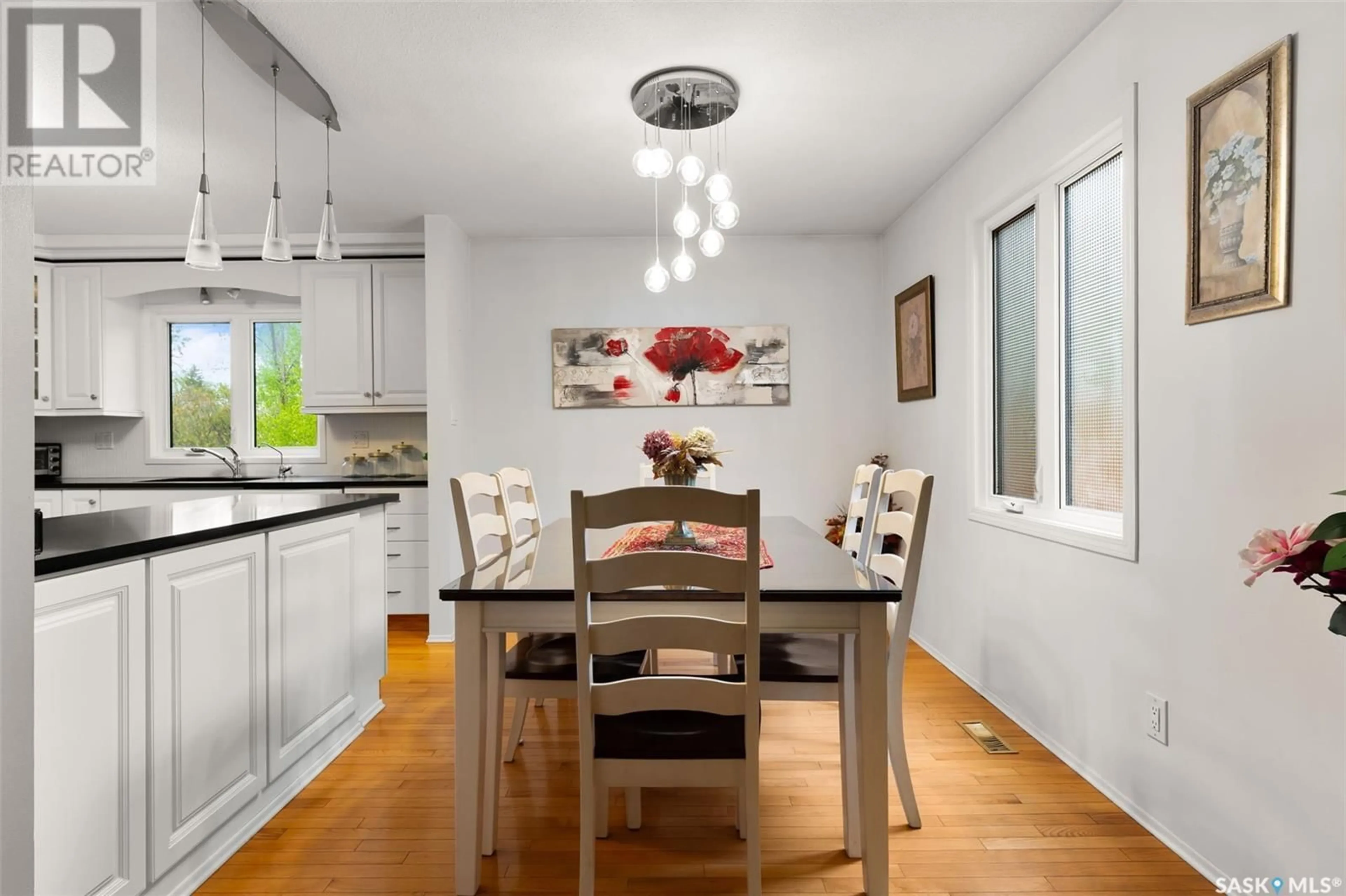 Dining room, wood/laminate floor for 122 MICHENER DRIVE, Regina Saskatchewan S4V0G8