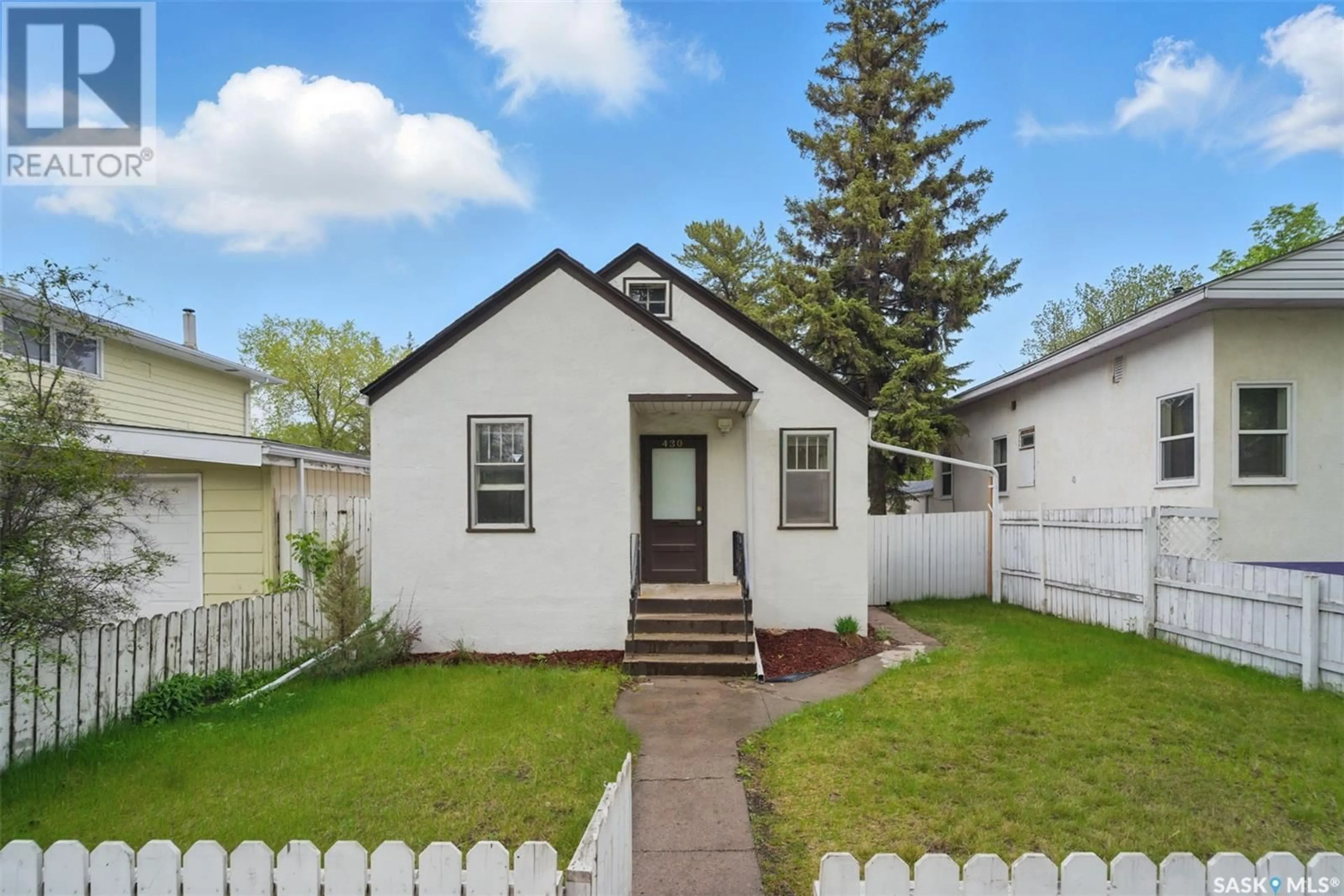 Home with vinyl exterior material, street for 430 J AVENUE, Saskatoon Saskatchewan S7M2A6