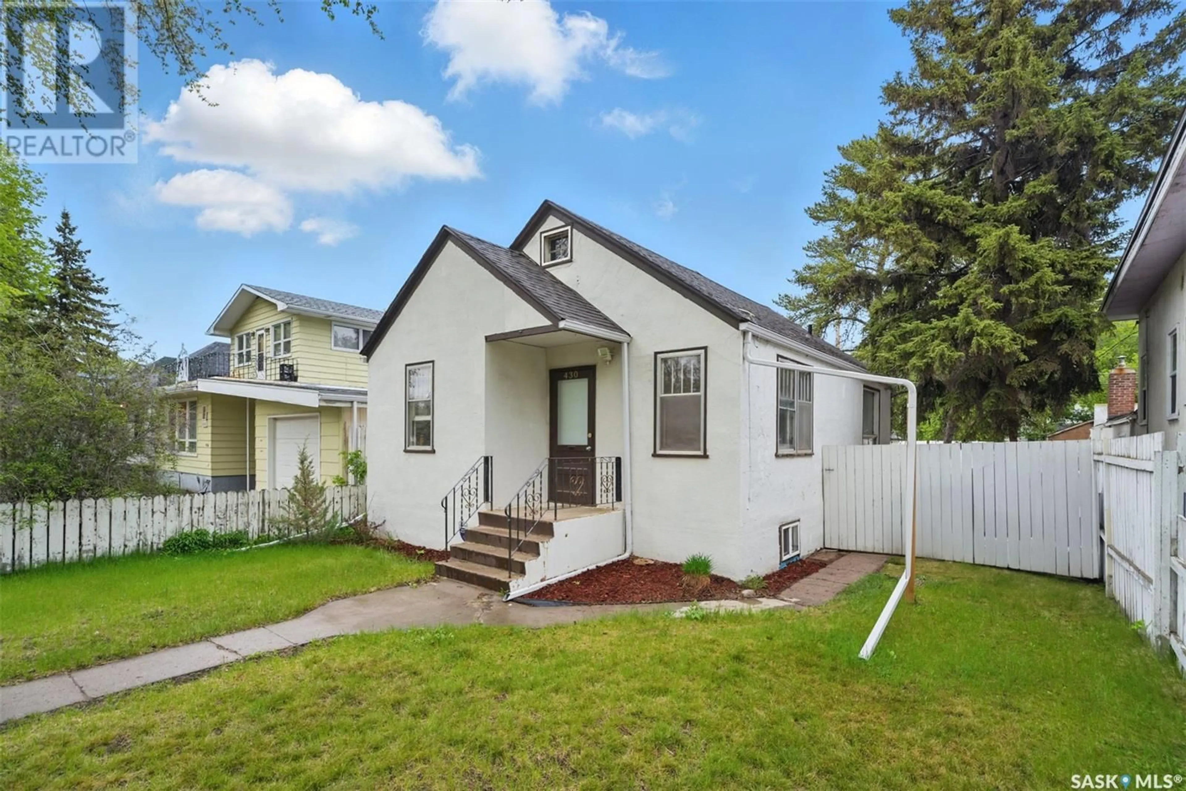 Home with vinyl exterior material, street for 430 J AVENUE, Saskatoon Saskatchewan S7M2A6