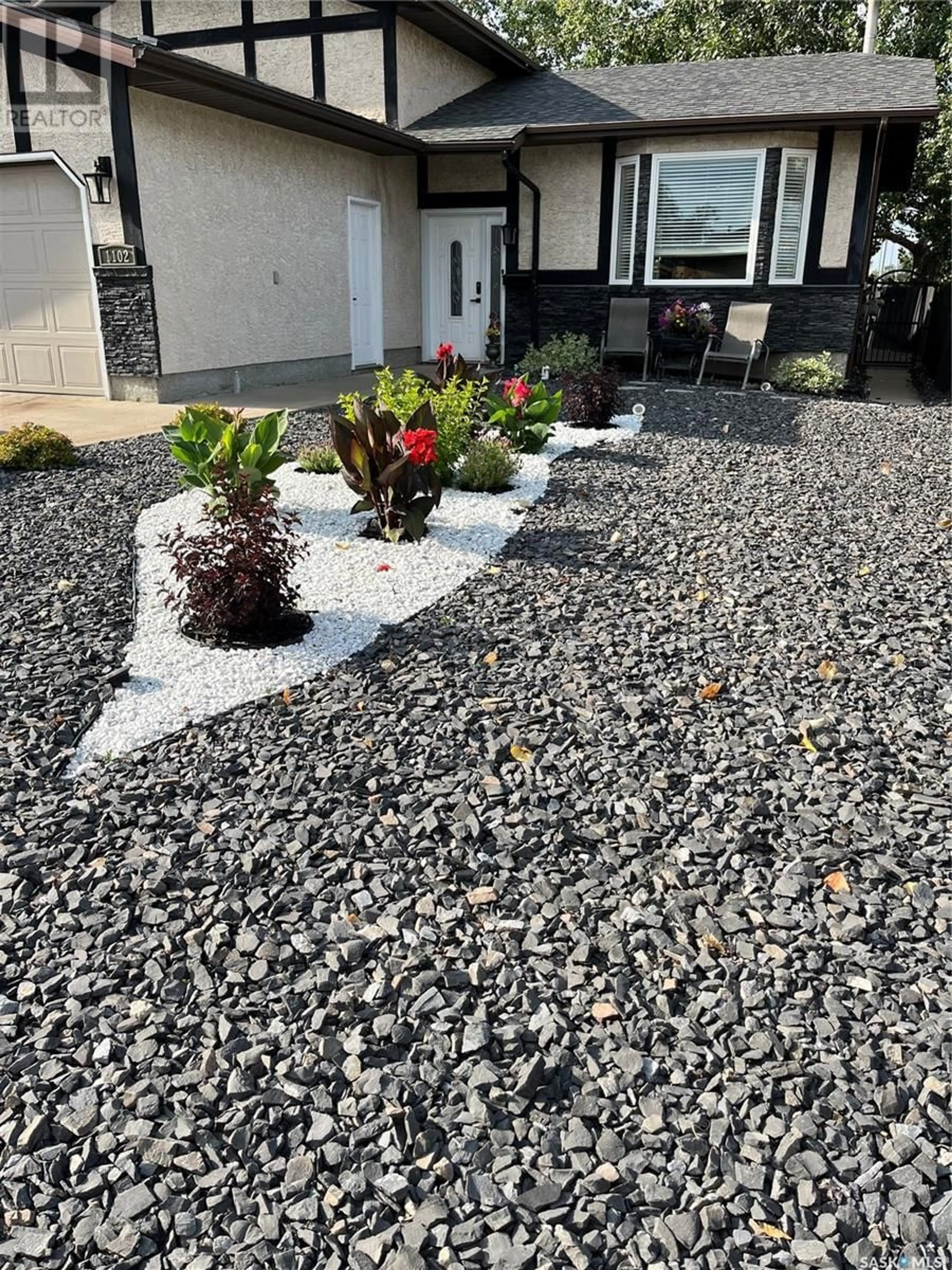 Home with vinyl exterior material, street for 1102 8TH AVENUE, Regina Saskatchewan S4R8M8