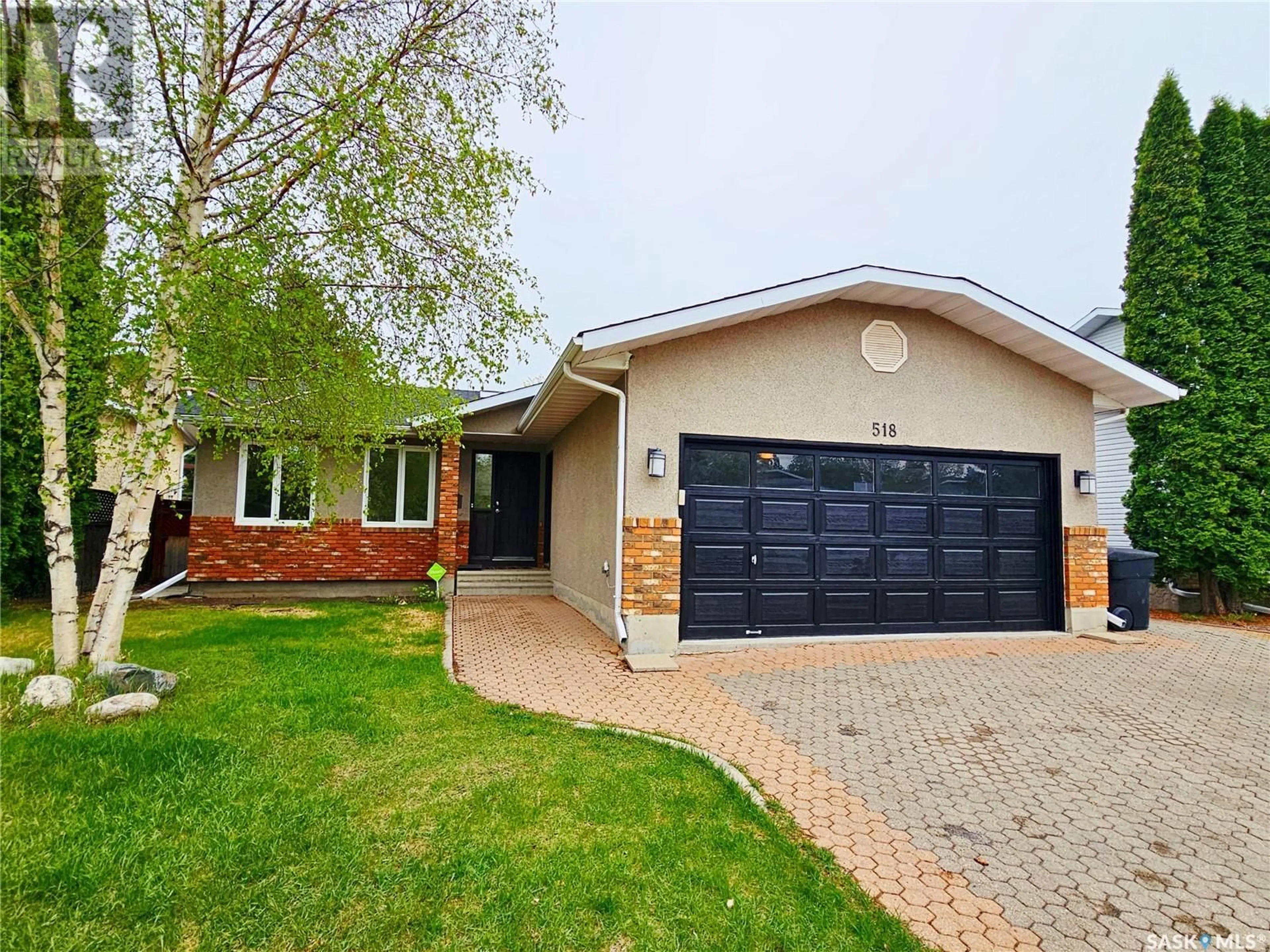 Home with brick exterior material, street for 518 BONLI CRESCENT, Saskatoon Saskatchewan S7N4A3