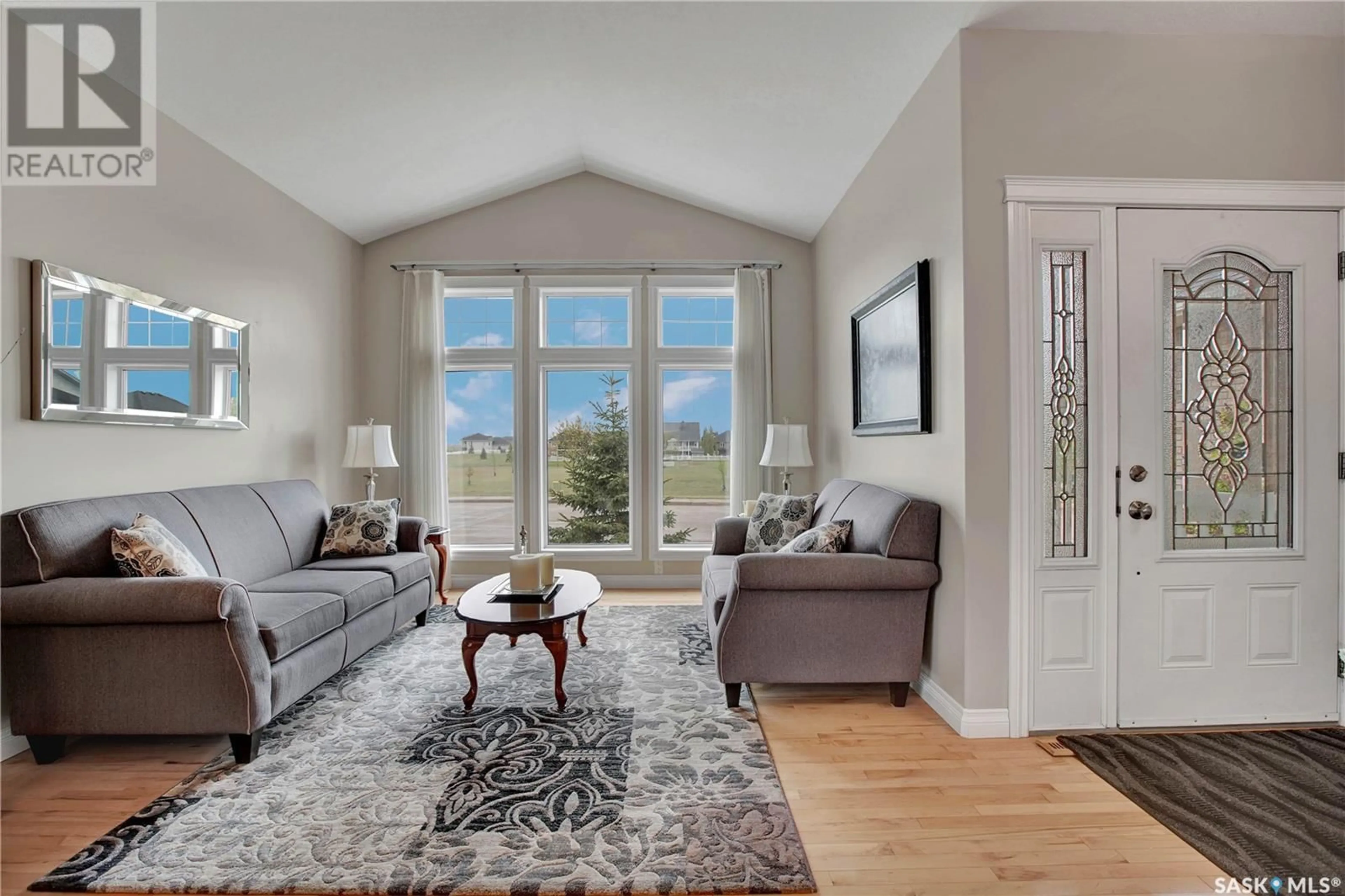 Living room with furniture, unknown for 302 LAKERIDGE DRIVE, Warman Saskatchewan S0K4S2