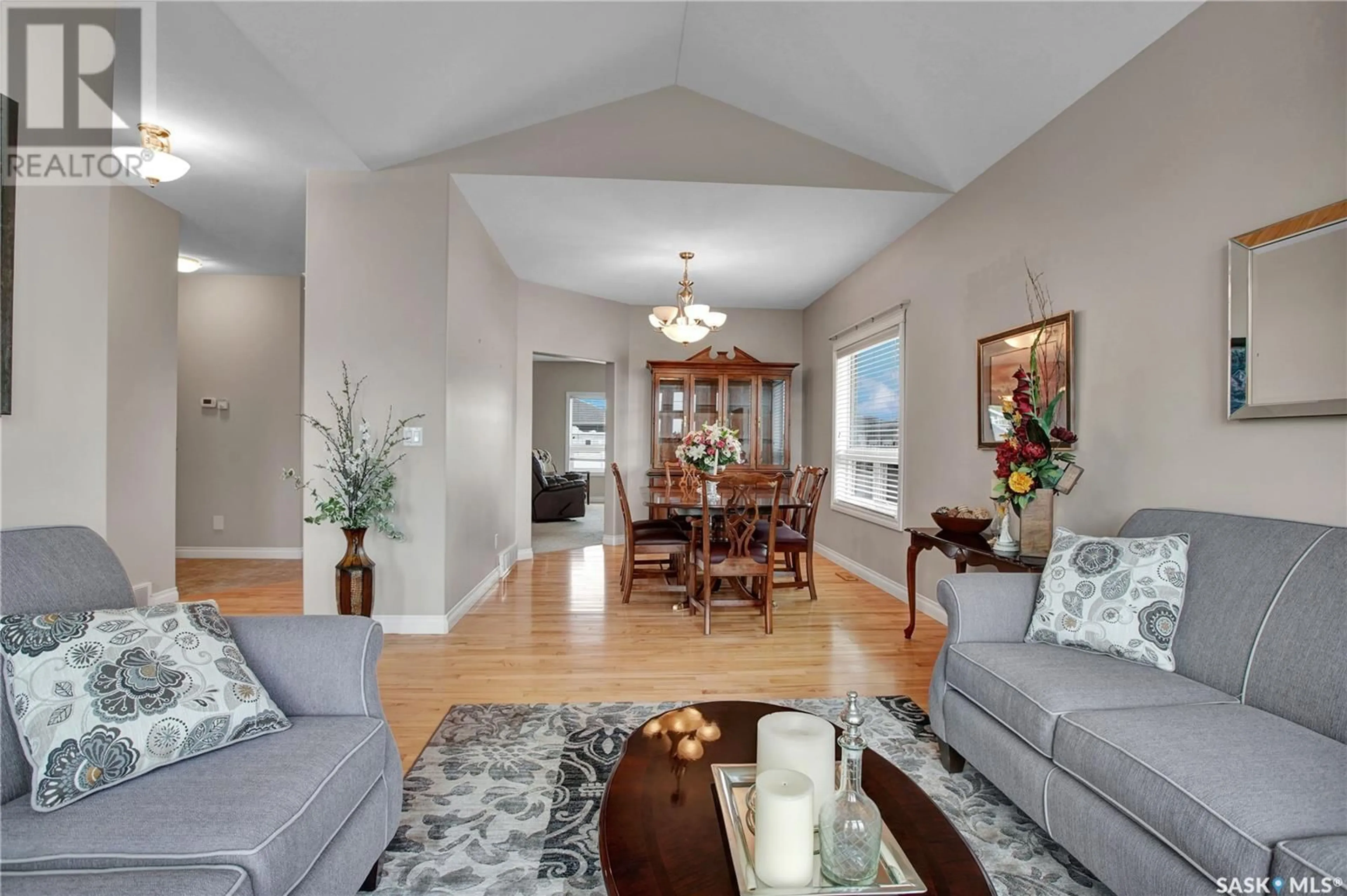 Living room with furniture, unknown for 302 LAKERIDGE DRIVE, Warman Saskatchewan S0K4S2