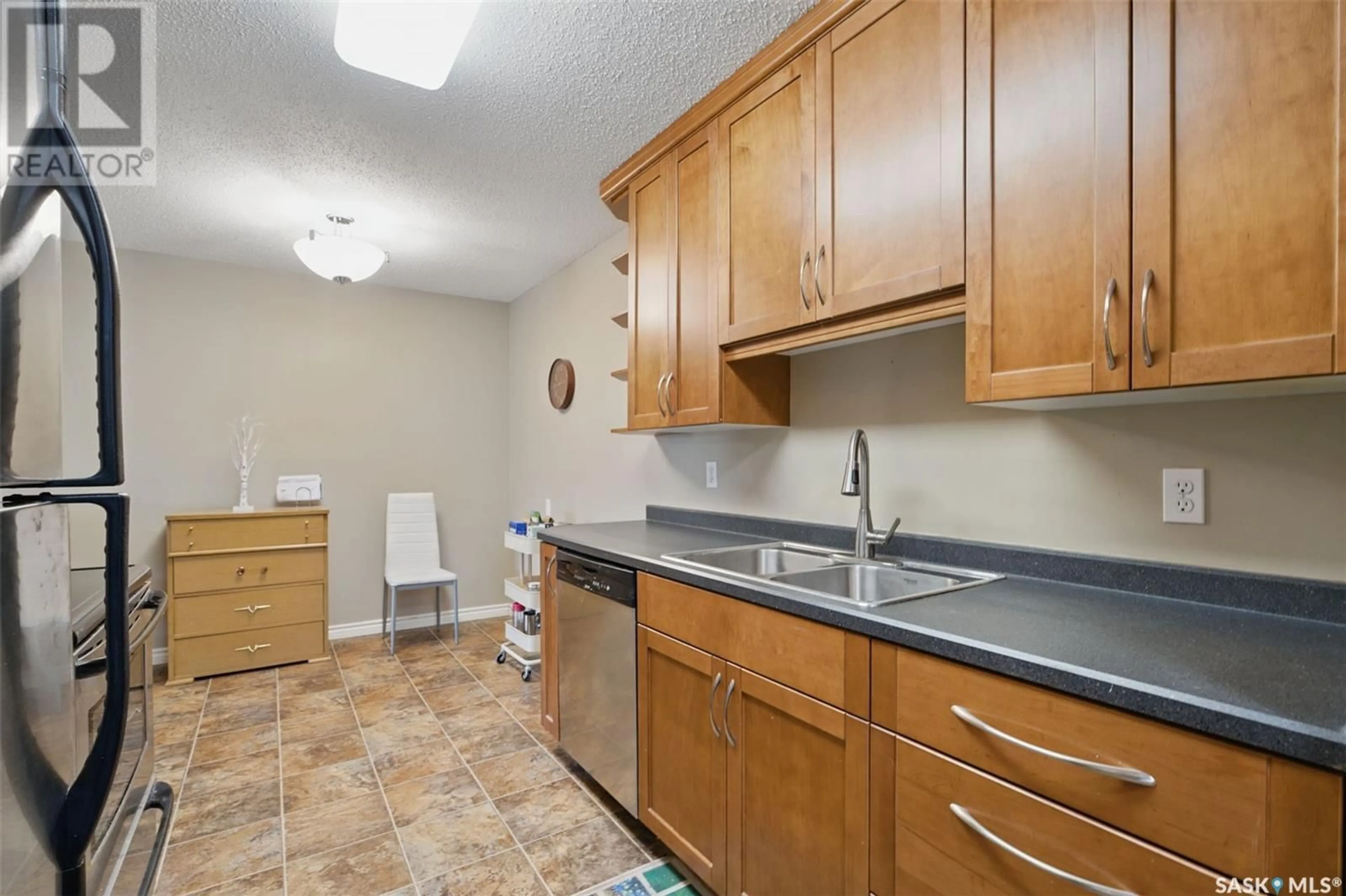 Standard kitchen, ceramic/tile floor for 310 - 733 STILLWATER DRIVE, Saskatoon Saskatchewan S7J4H7