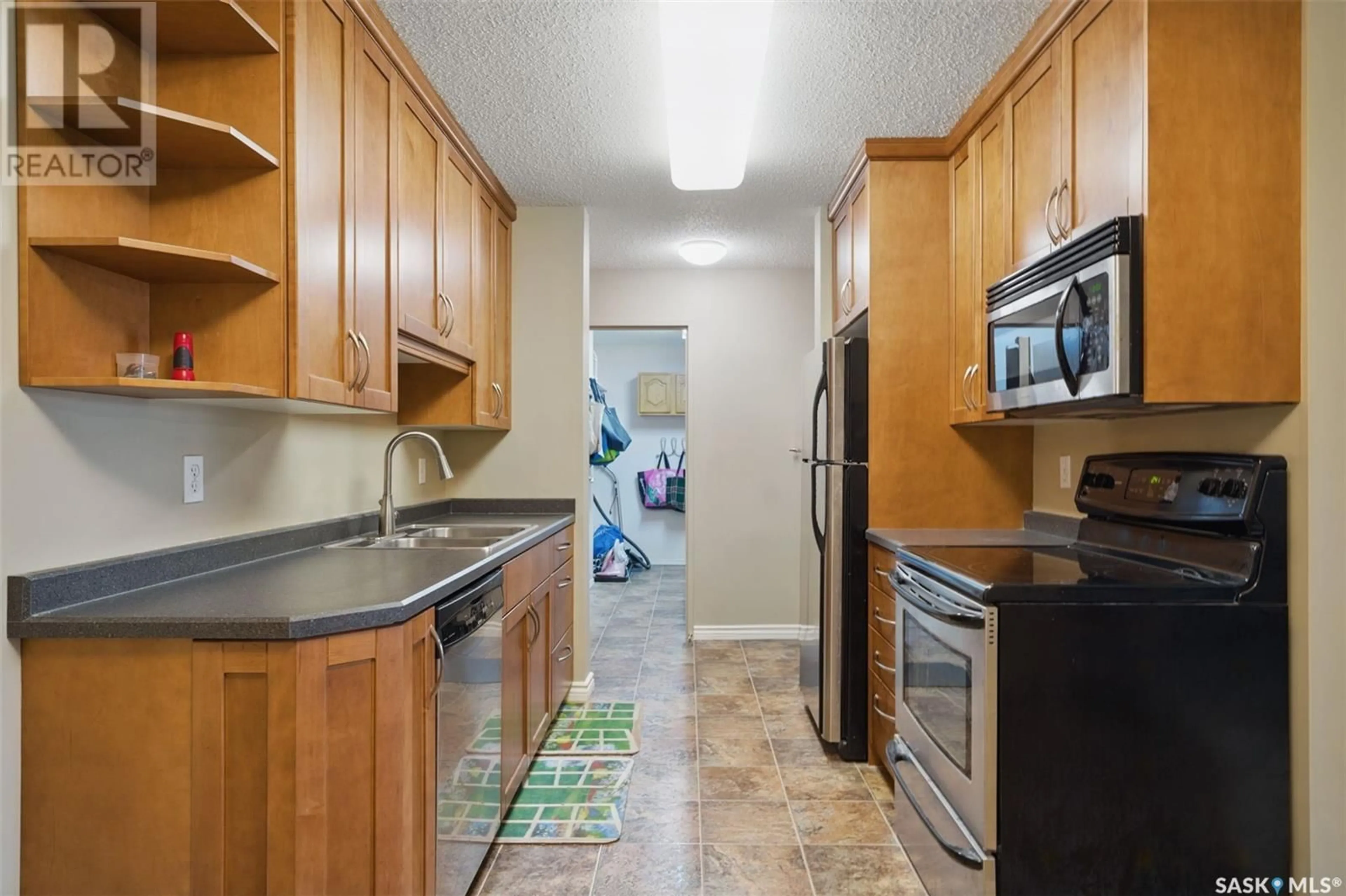 Standard kitchen, ceramic/tile floor for 310 - 733 STILLWATER DRIVE, Saskatoon Saskatchewan S7J4H7